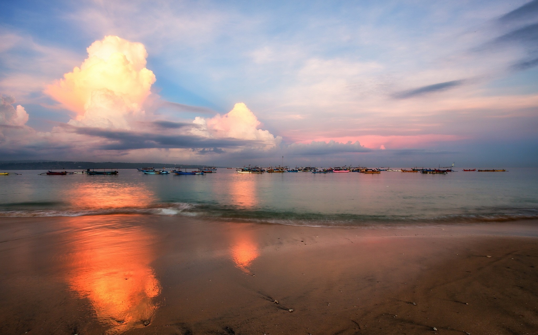 Boats on the sea at sunset with colorful clouds and reflection HD Wallpaper