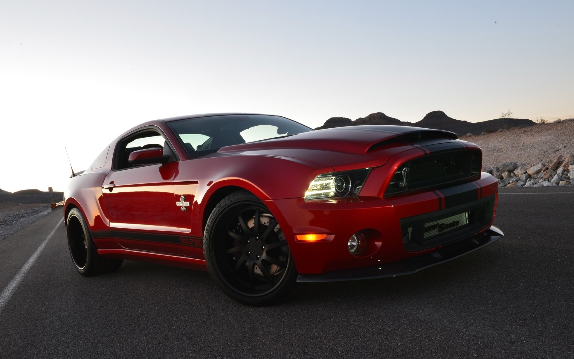 Red Ford Shelby GT500 Super Snake parked on a road HD Wallpaper