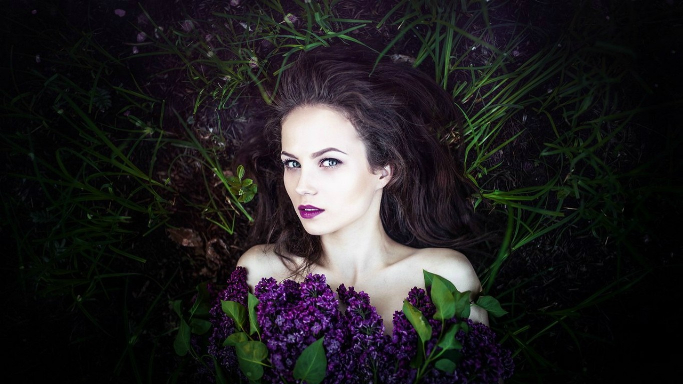 Woman with purple flowers and green eyes HD Wallpaper