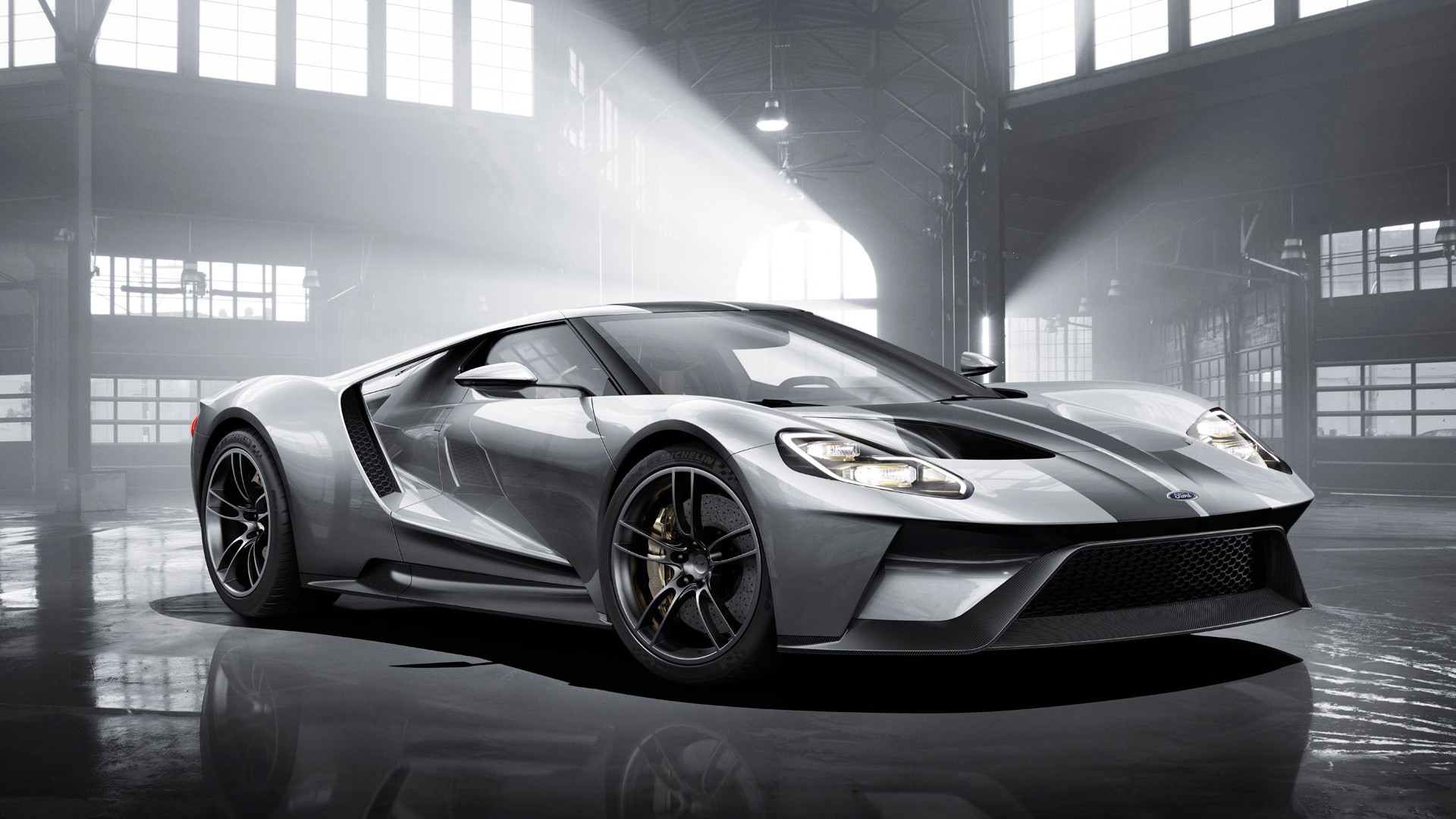 Silver Ford GT sports car in a warehouse HD Wallpaper
