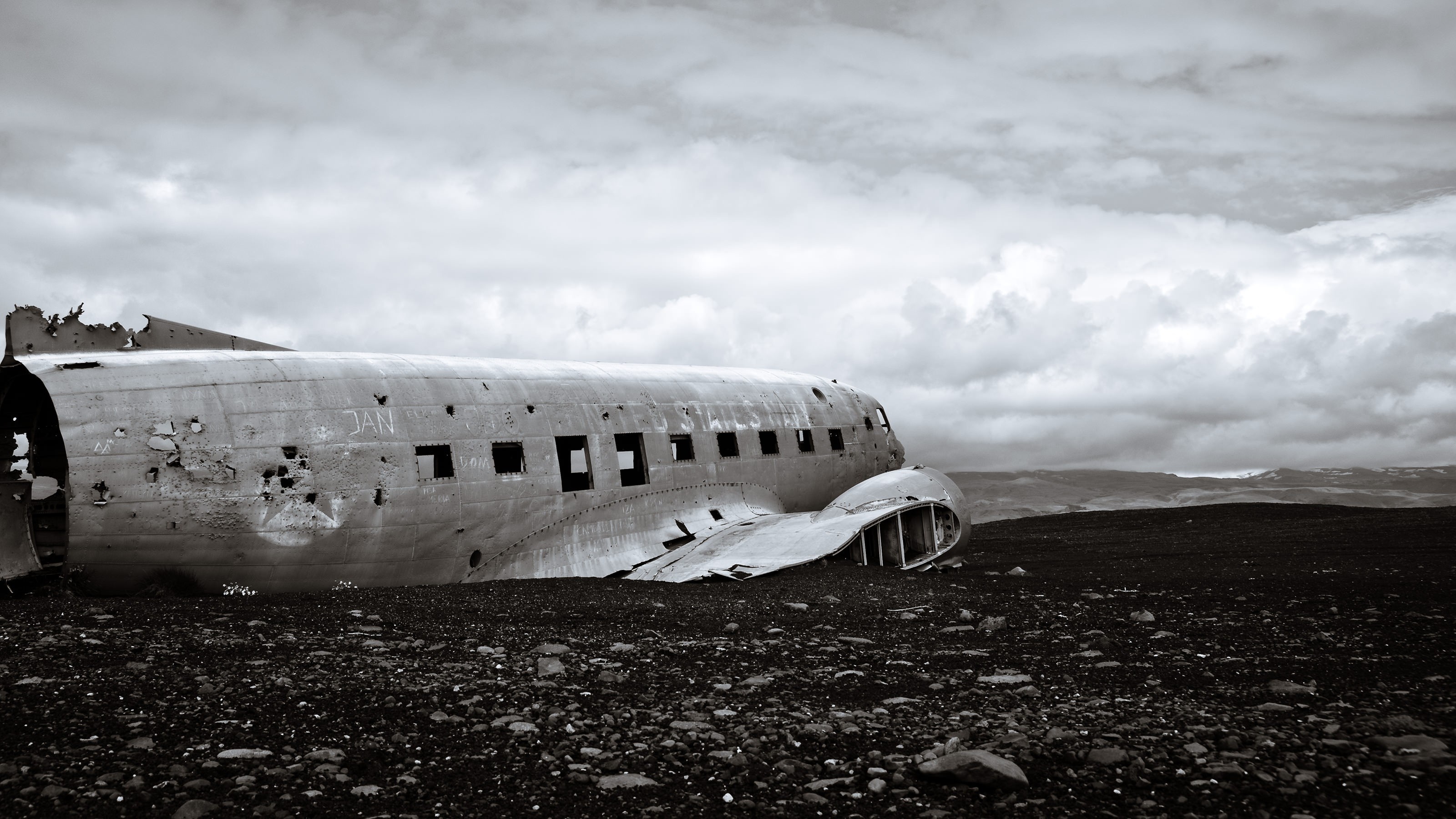Wrecked airplane on a rocky beach in Iceland HD Wallpaper
