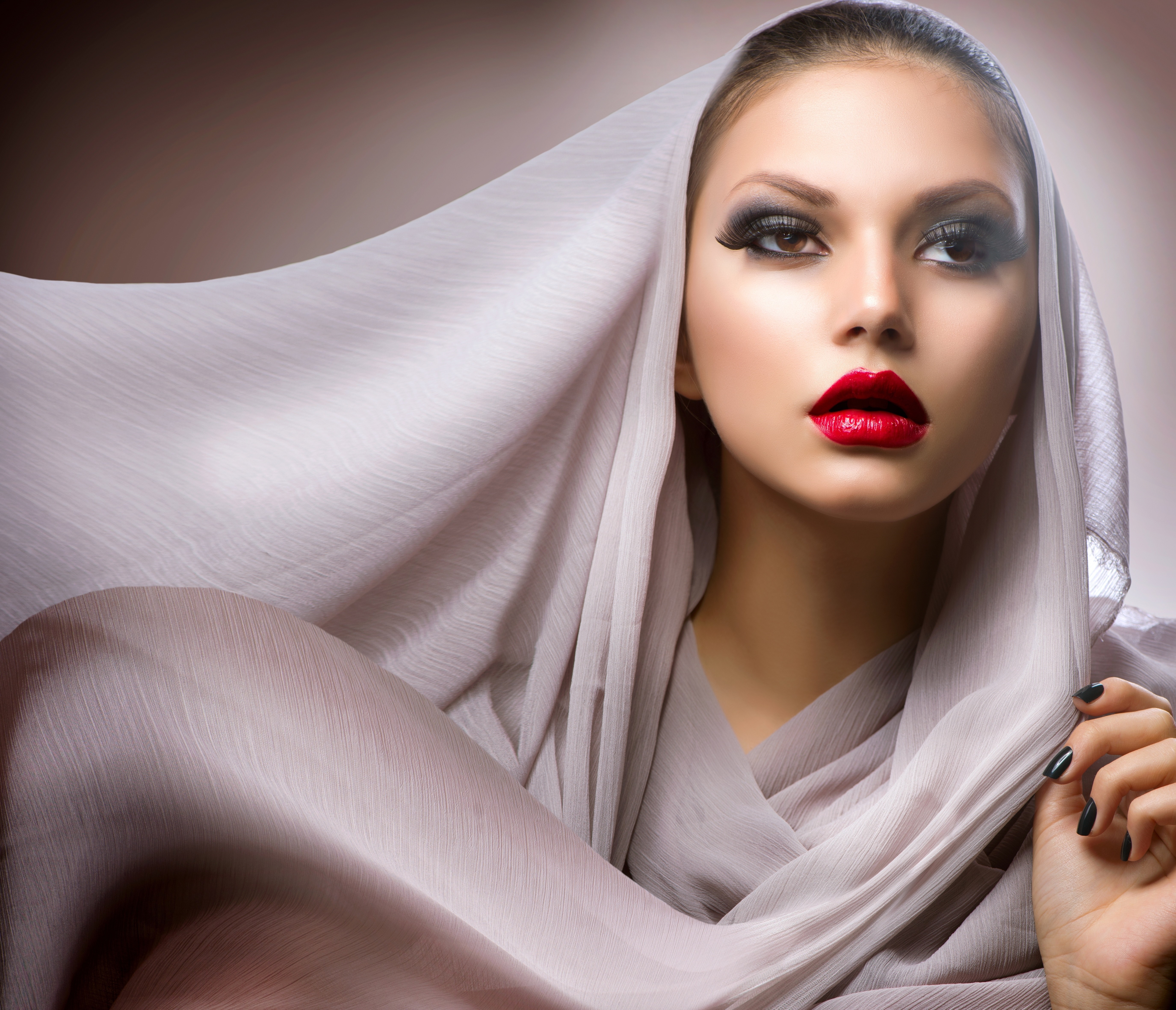 Woman with dramatic makeup and headscarf HD Wallpaper