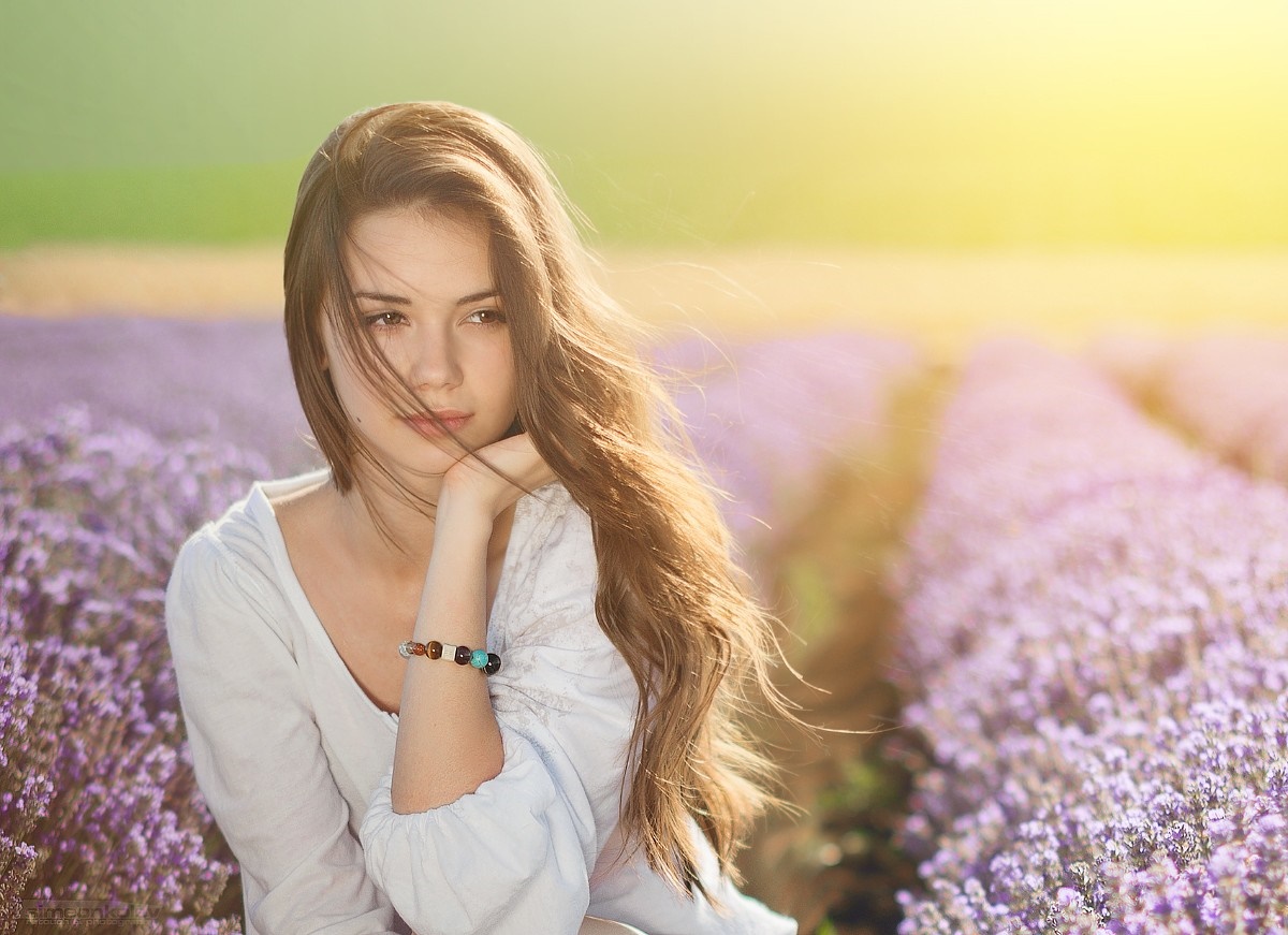 Woman with long brown hair in a lavender field HD Wallpaper