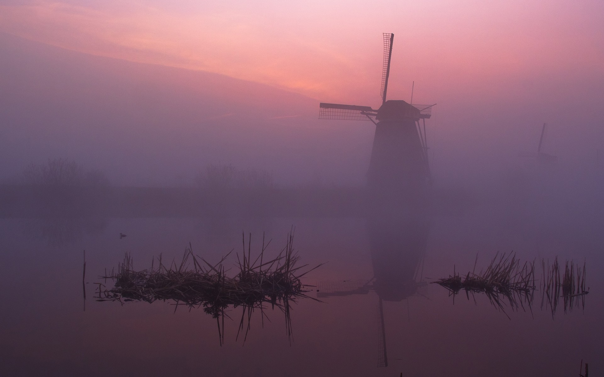 Windmills in the mist at sunrise HD Wallpaper