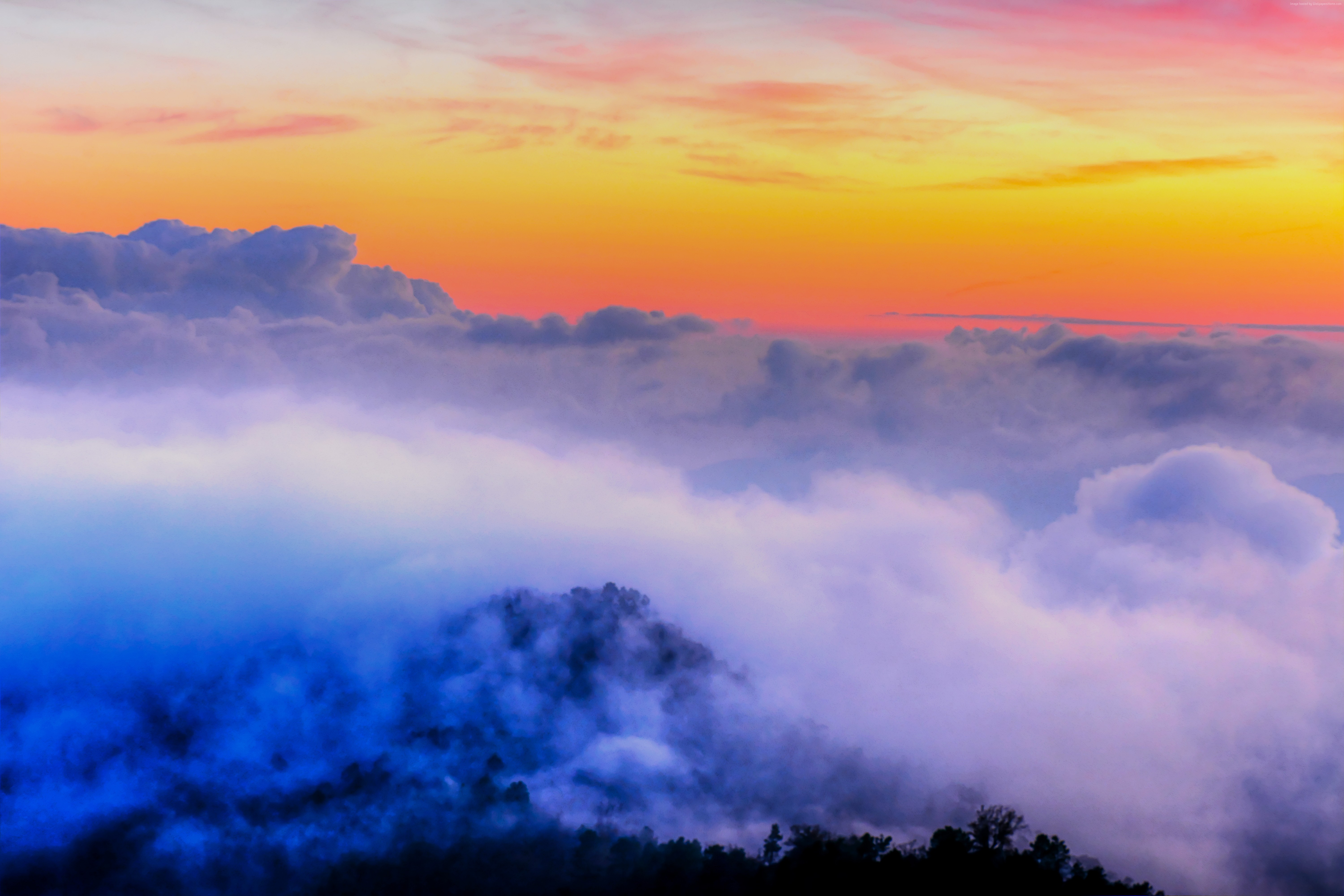 Clouds over mountains at sunset HD Wallpaper