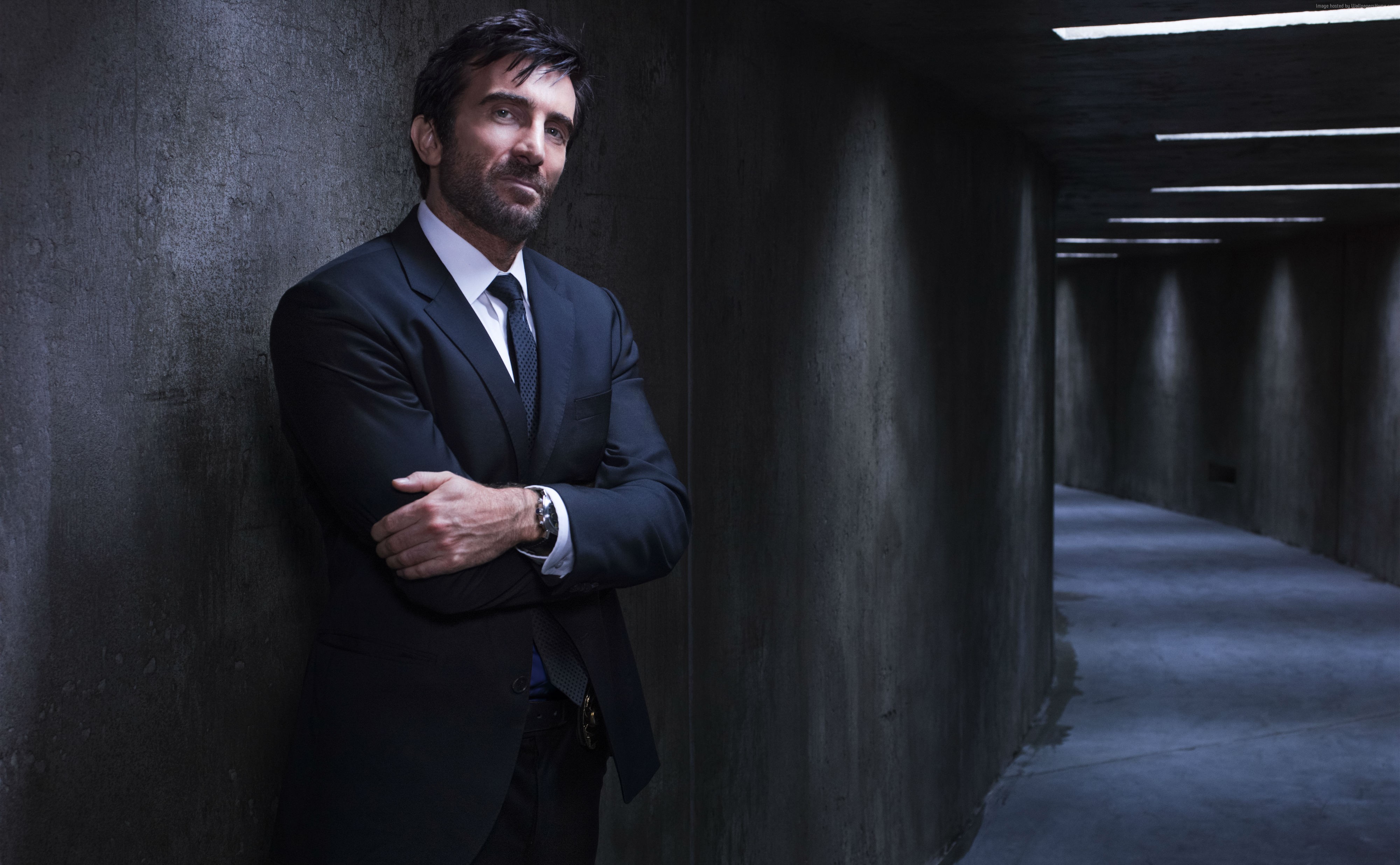 Sharlto Copley in a dark hallway HD Wallpaper
