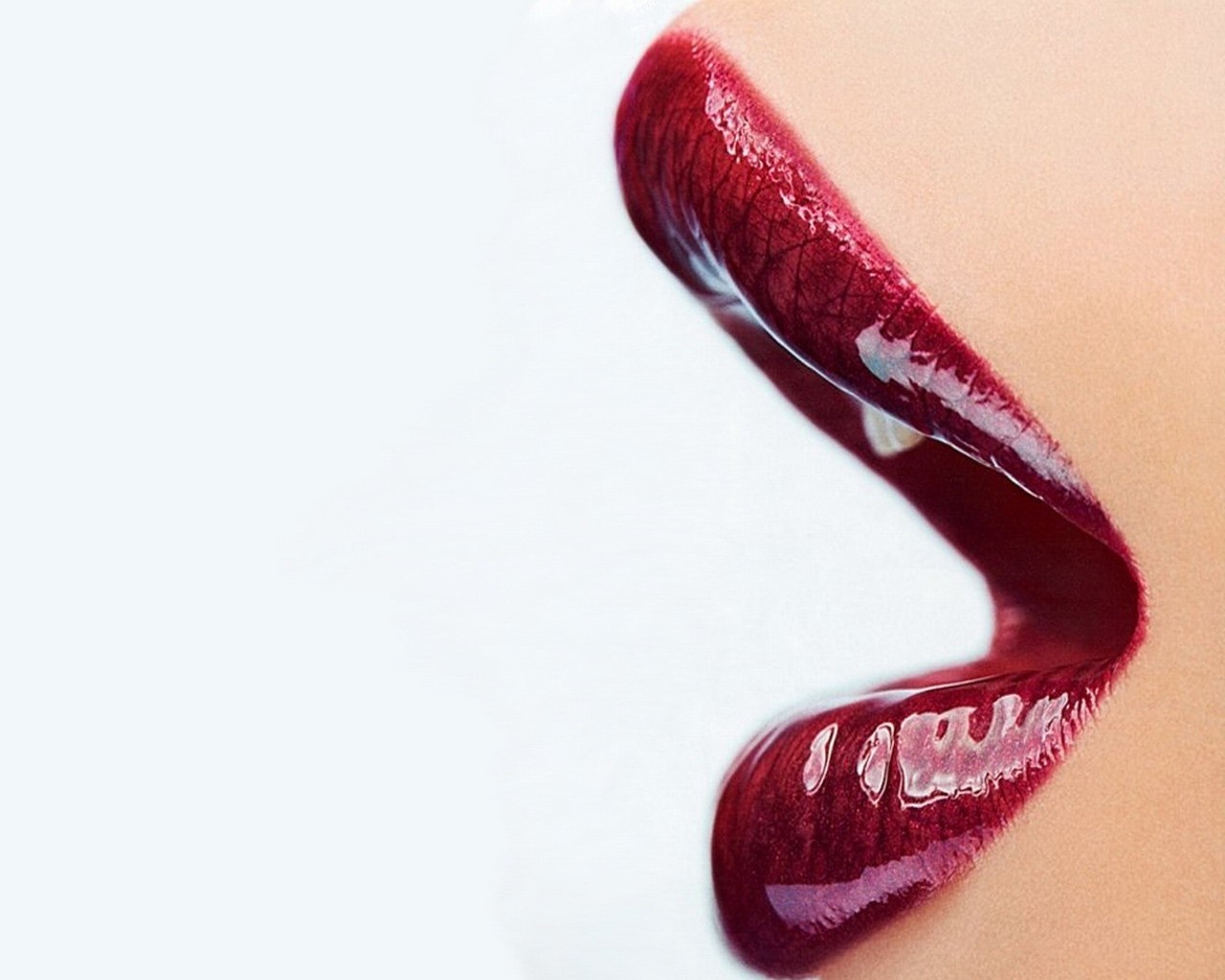 Close-up of glossy dark red lips HD Wallpaper
