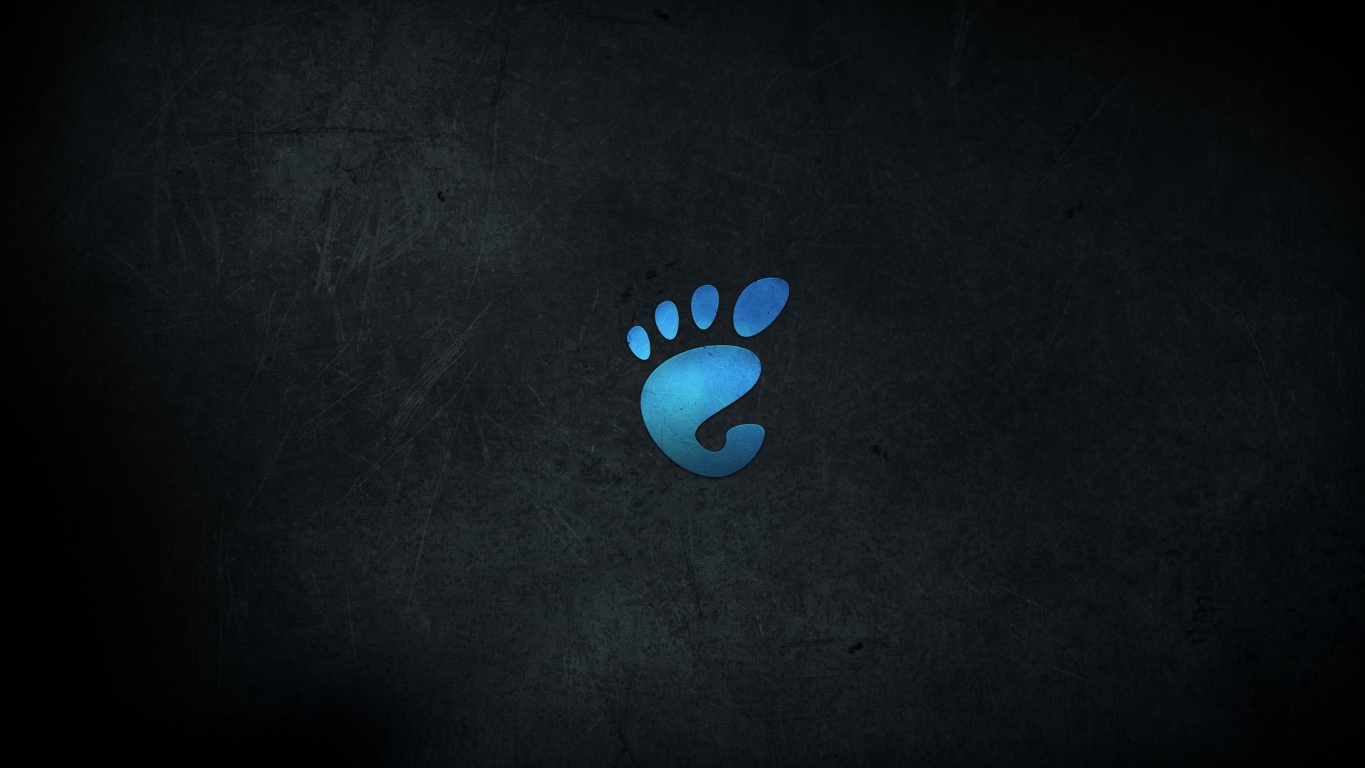GNOME logo on a dark textured background HD Wallpaper