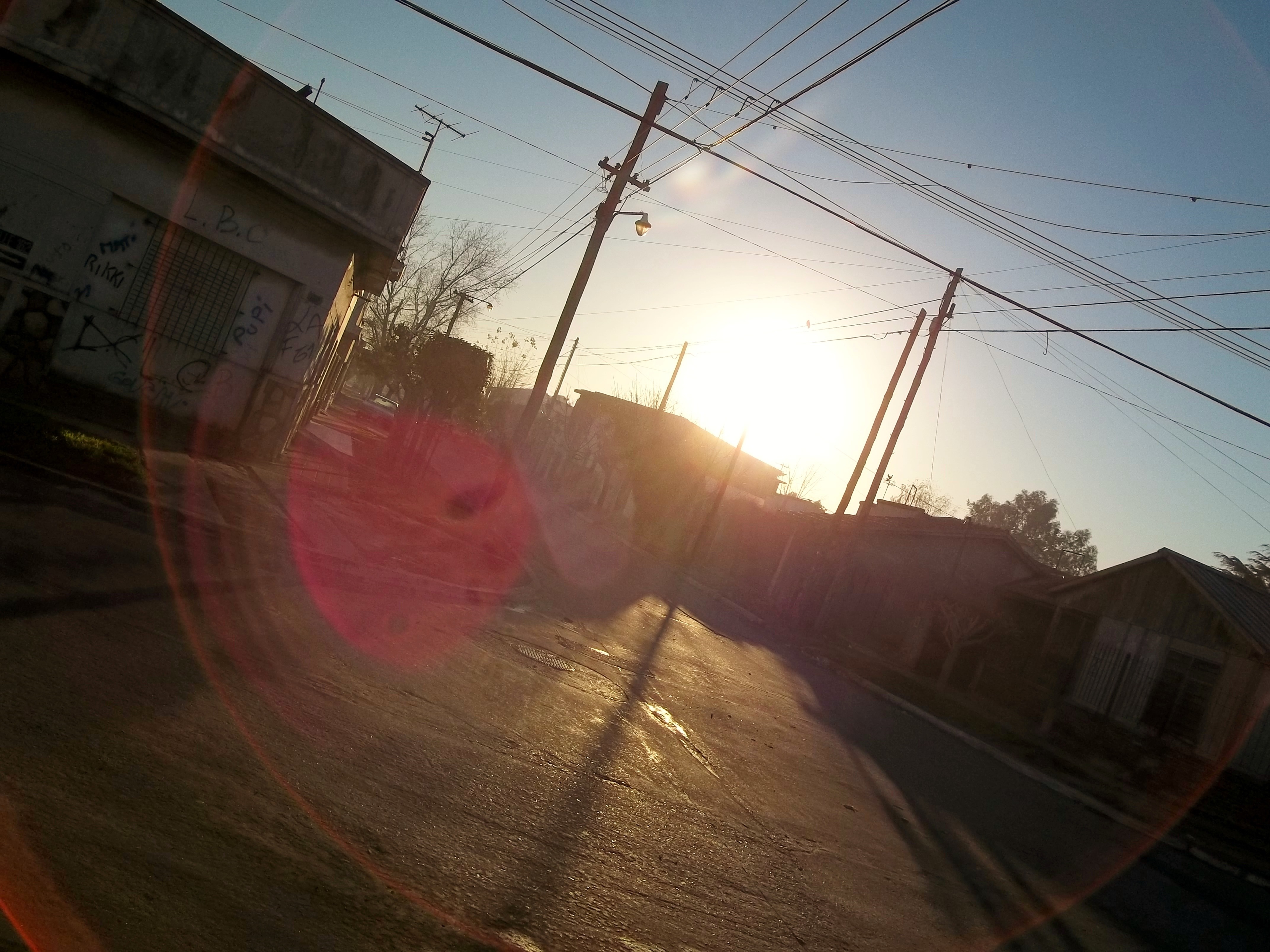 Street with power lines at sunset HD Wallpaper