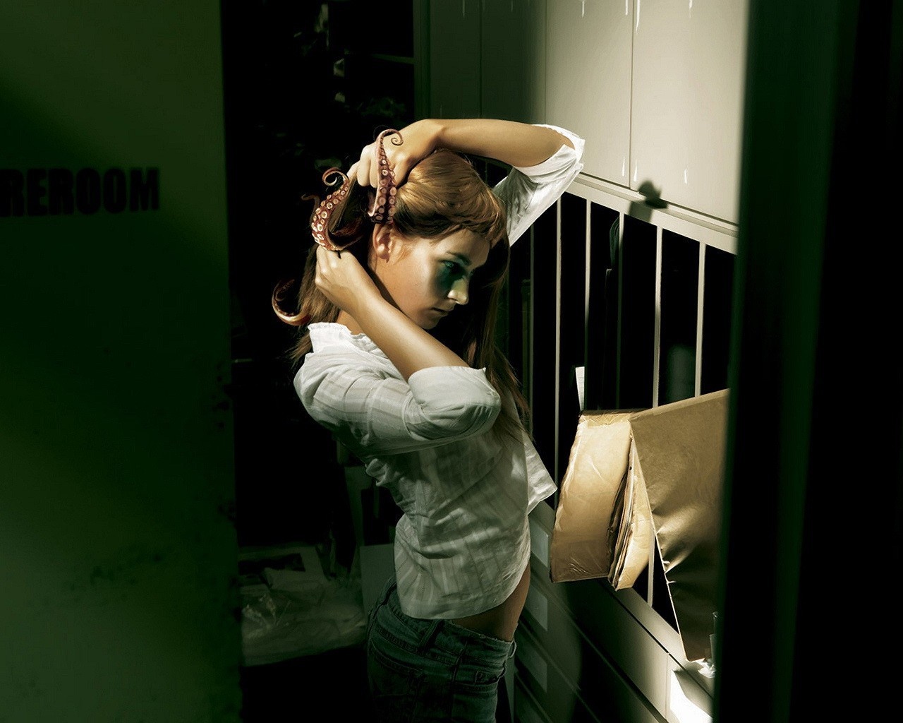 Woman with tentacles in hair in a dark room HD Wallpaper