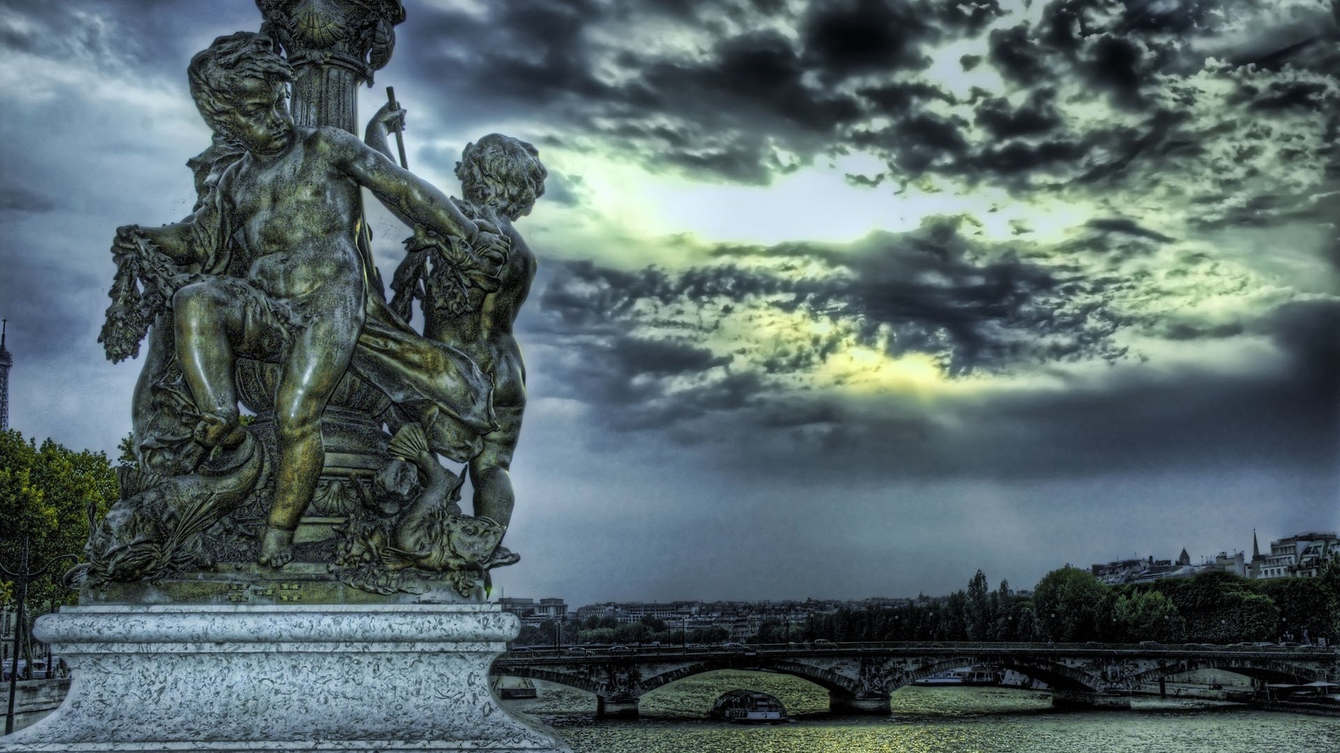 Statue on a bridge over a river in Paris HD Wallpaper
