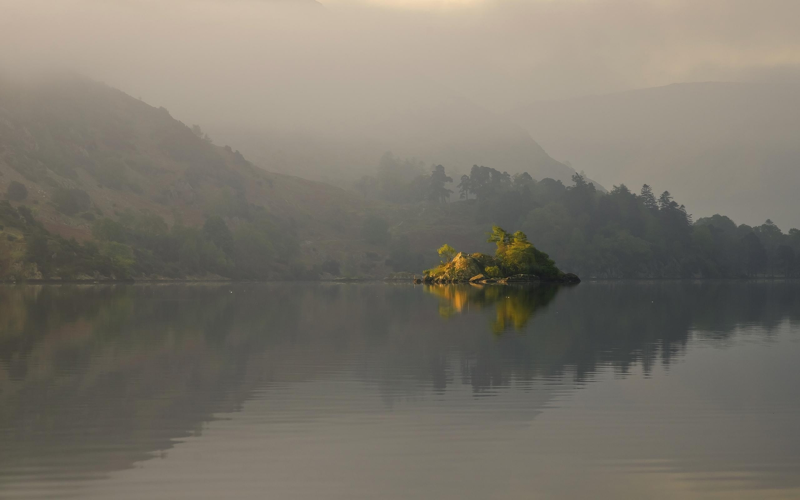 Misty lake with island and reflection at dawn HD Wallpaper