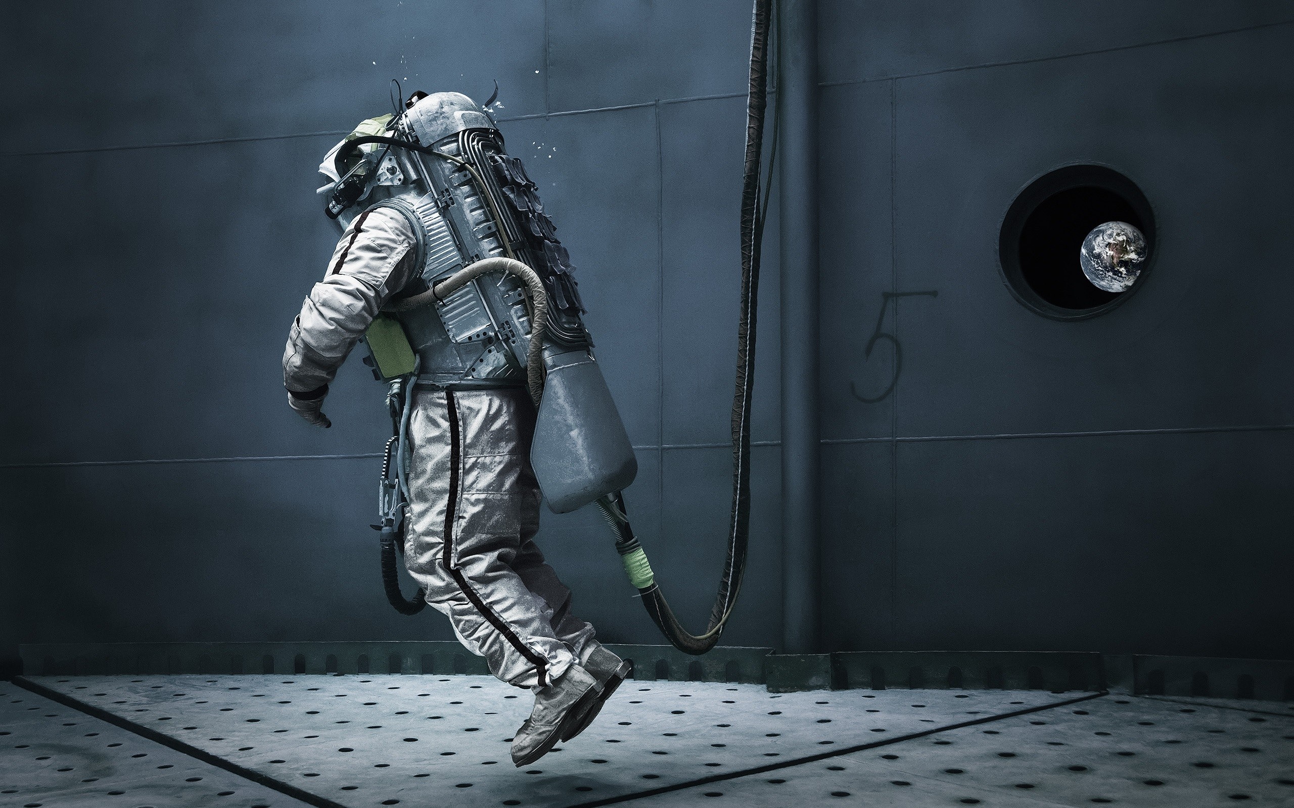 Astronaut floating in a dark room with Earth visible through a window HD Wallpaper