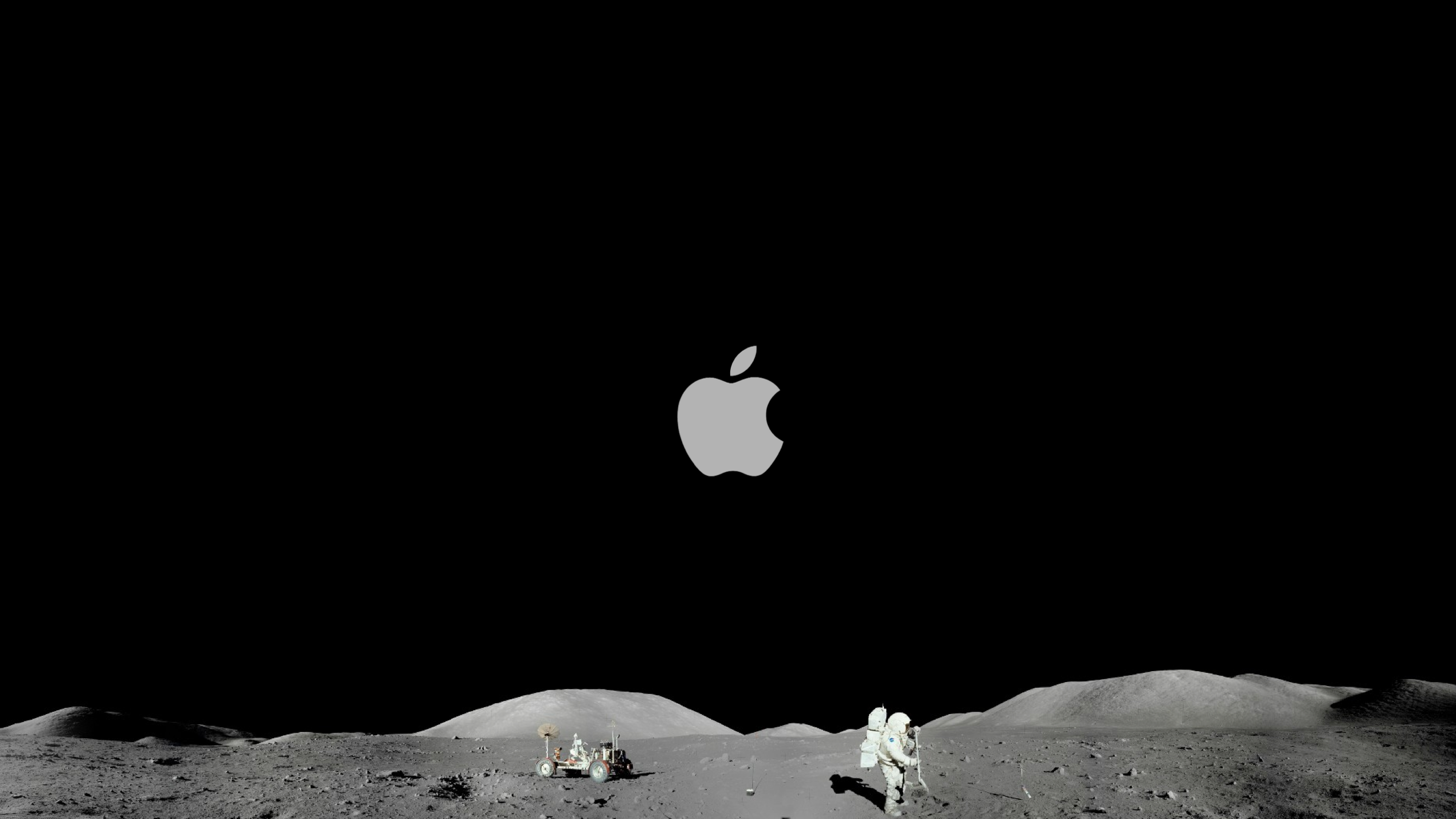 Apple logo on the Moon with astronaut and rover HD Wallpaper
