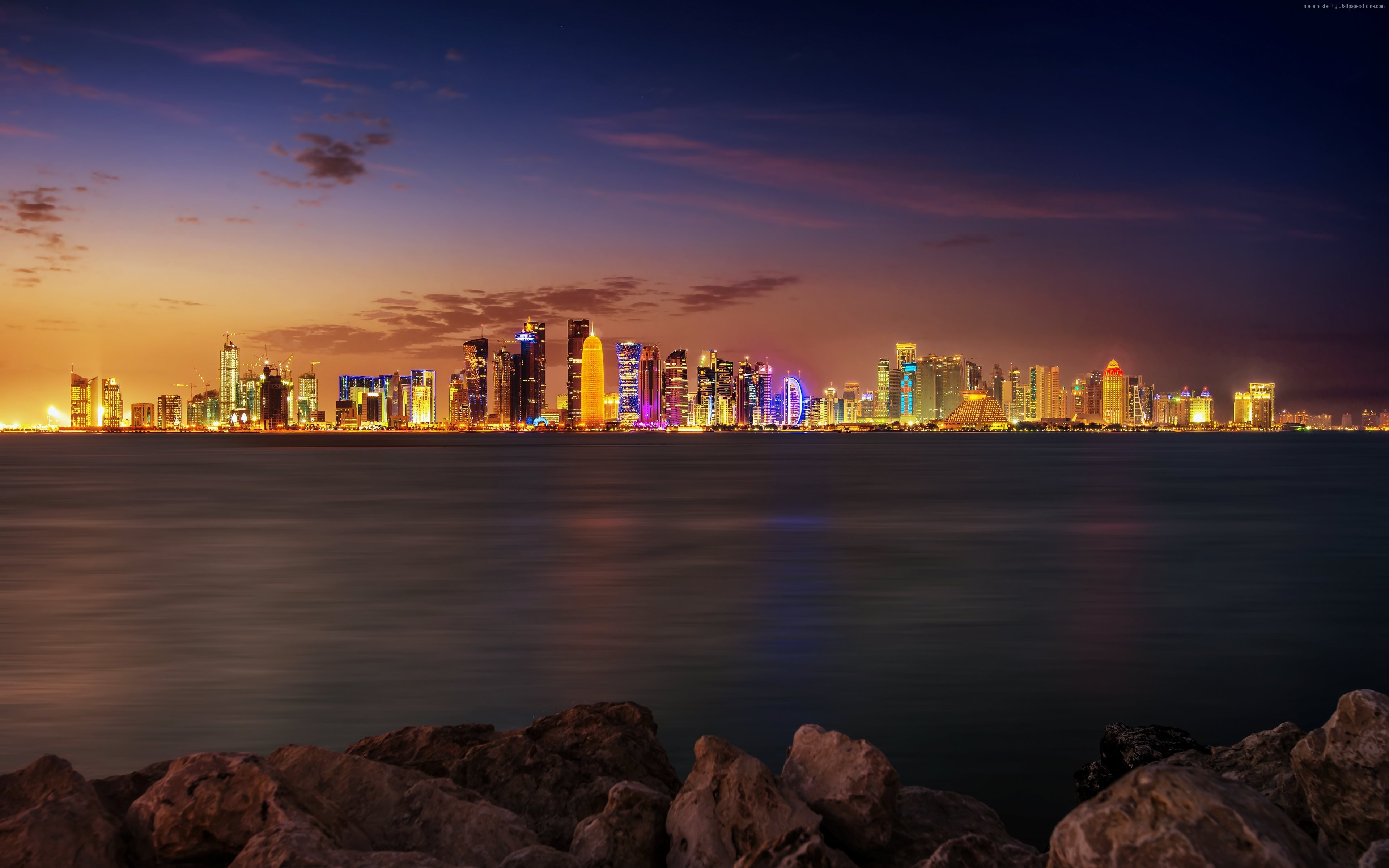 Doha skyline at dusk over the Persian Gulf HD Wallpaper