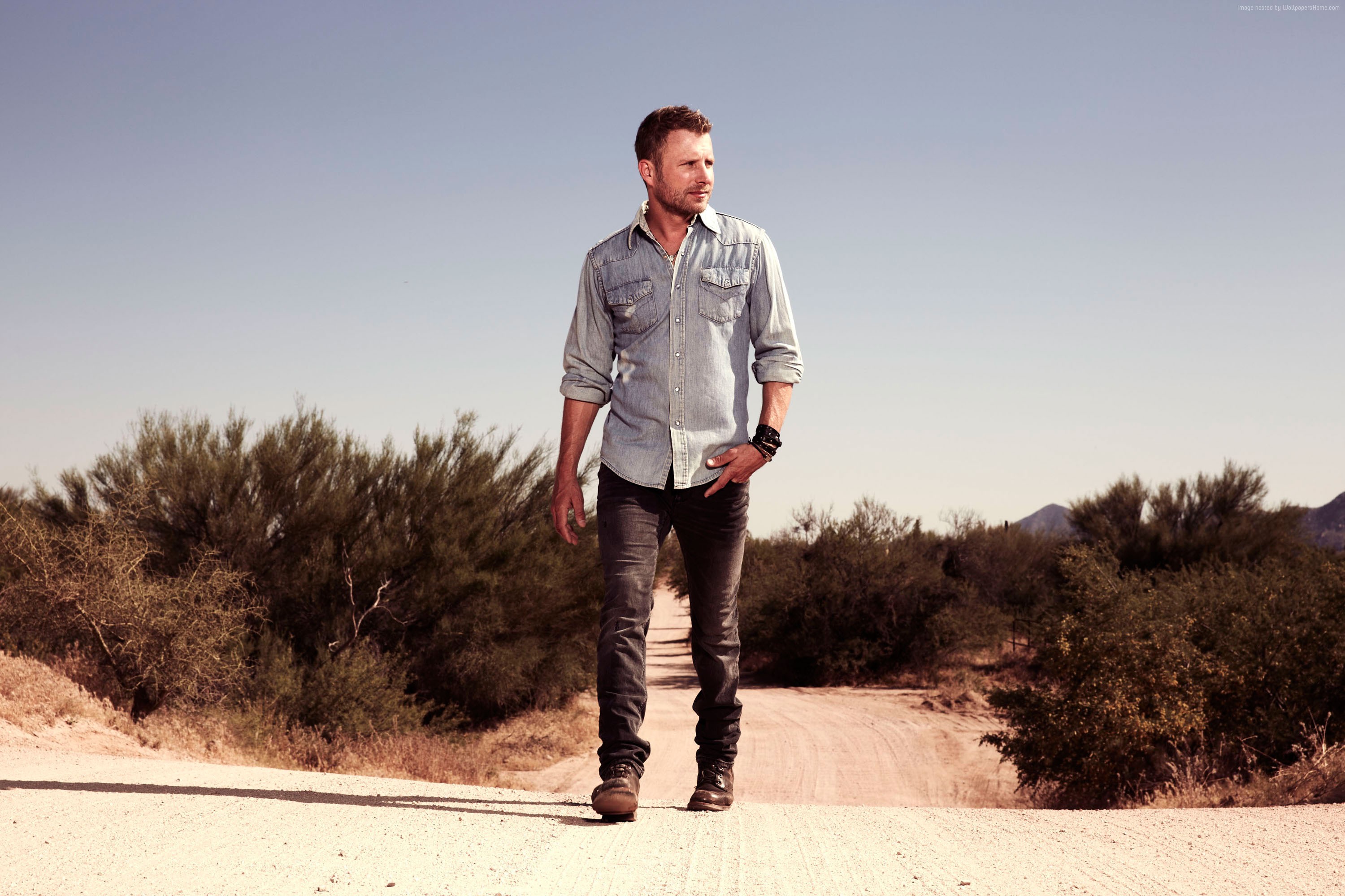 Dierks Bentley walking on a dirt road HD Wallpaper