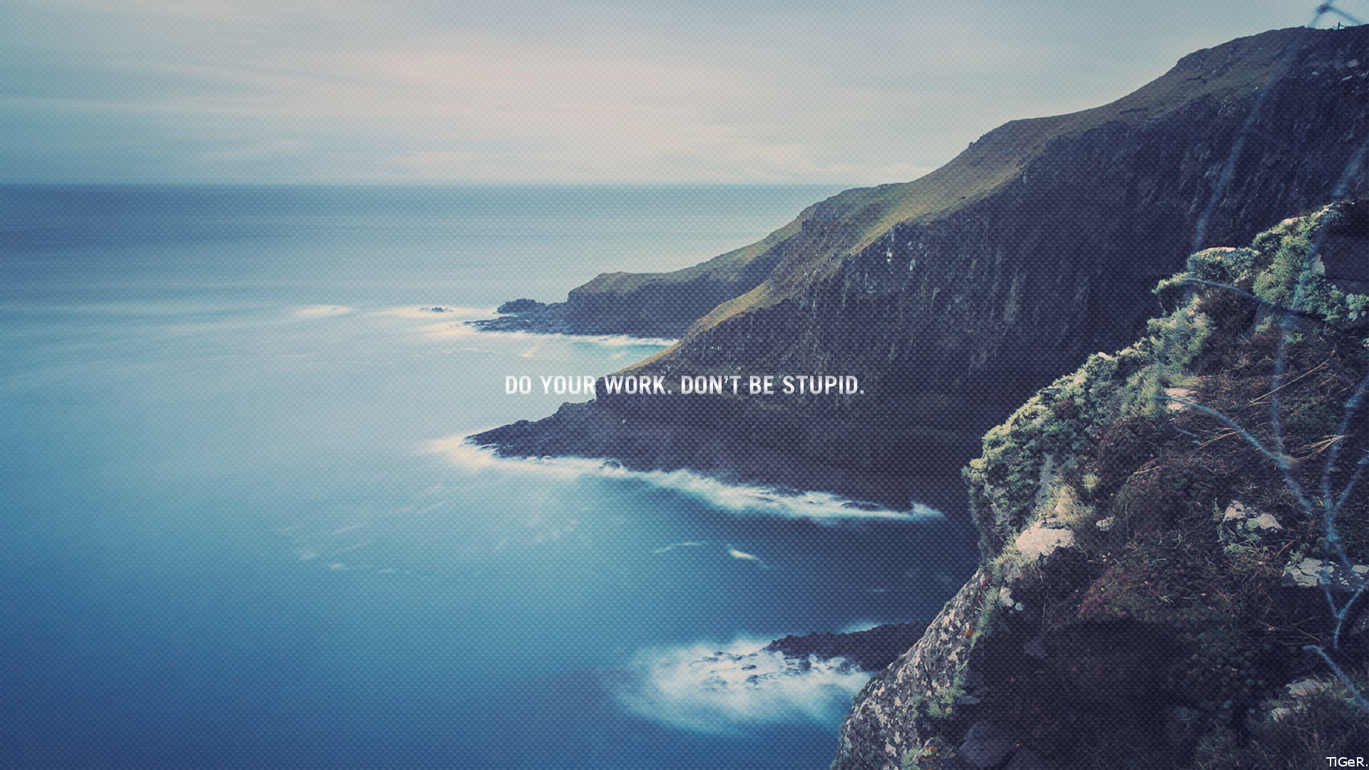 Motivational quote on a coastal cliff overlooking the sea HD Wallpaper