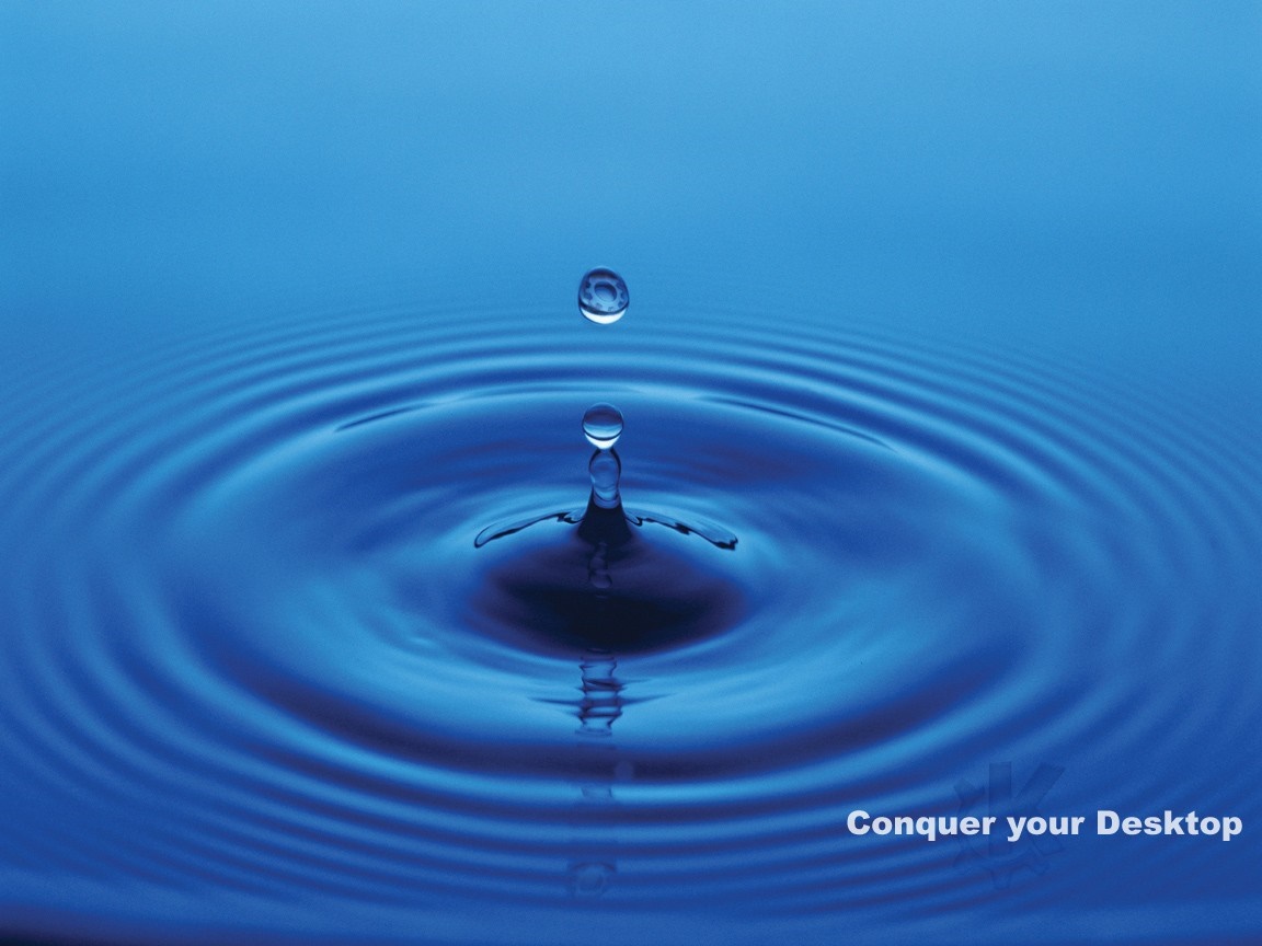 Water drop creating ripples on blue surface HD Wallpaper