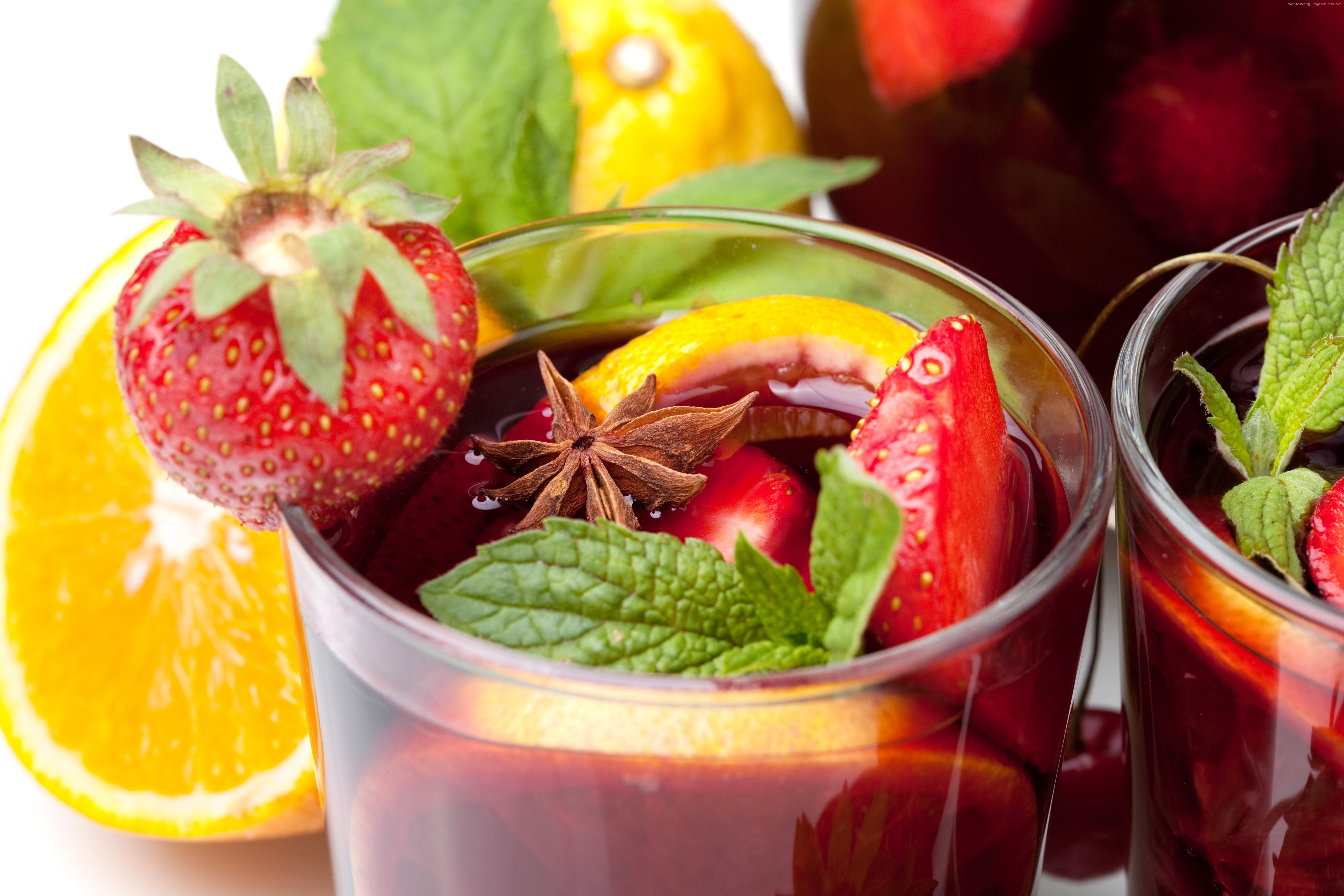Sangria with strawberries, oranges, lemons, mint, and cinnamon HD Wallpaper