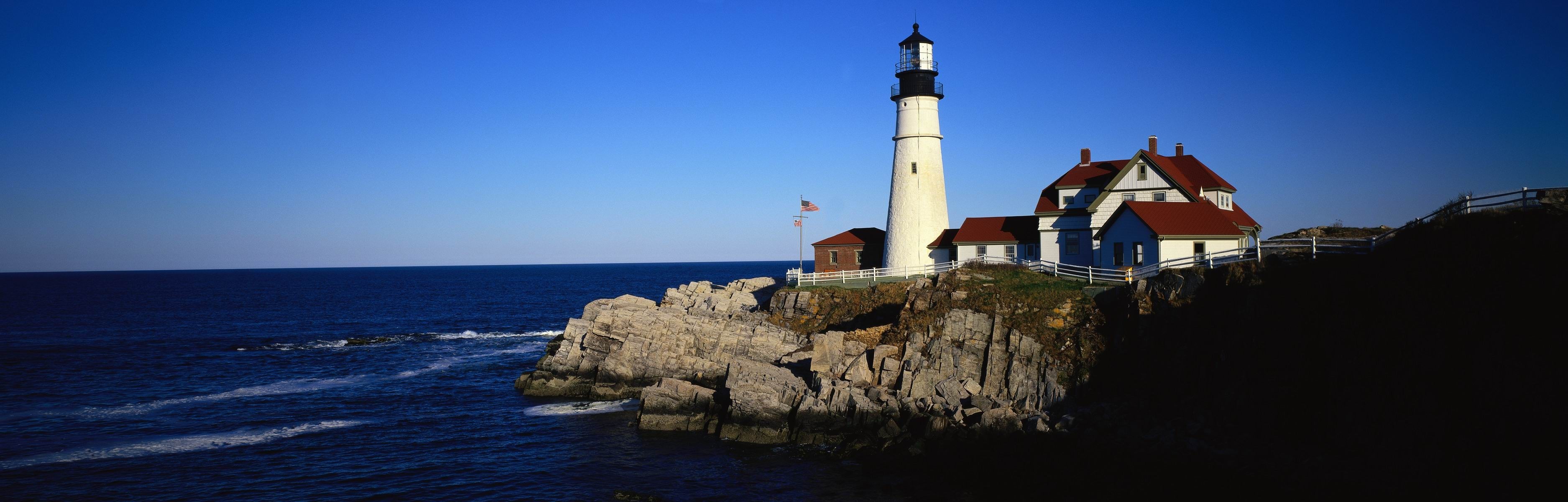 Portland Head Light lighthouse on a rocky coast HD Wallpaper