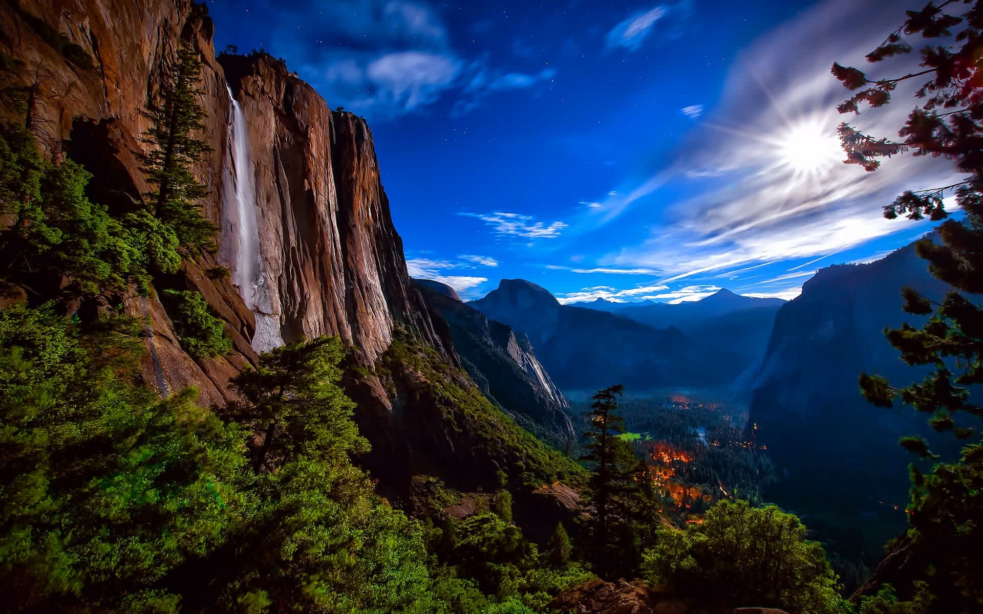 Yosemite National Park at night with moonlit waterfall HD Wallpaper