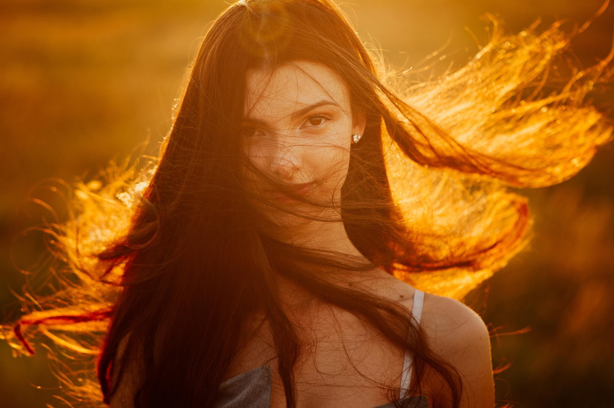 Woman with long hair in sunlight HD Wallpaper