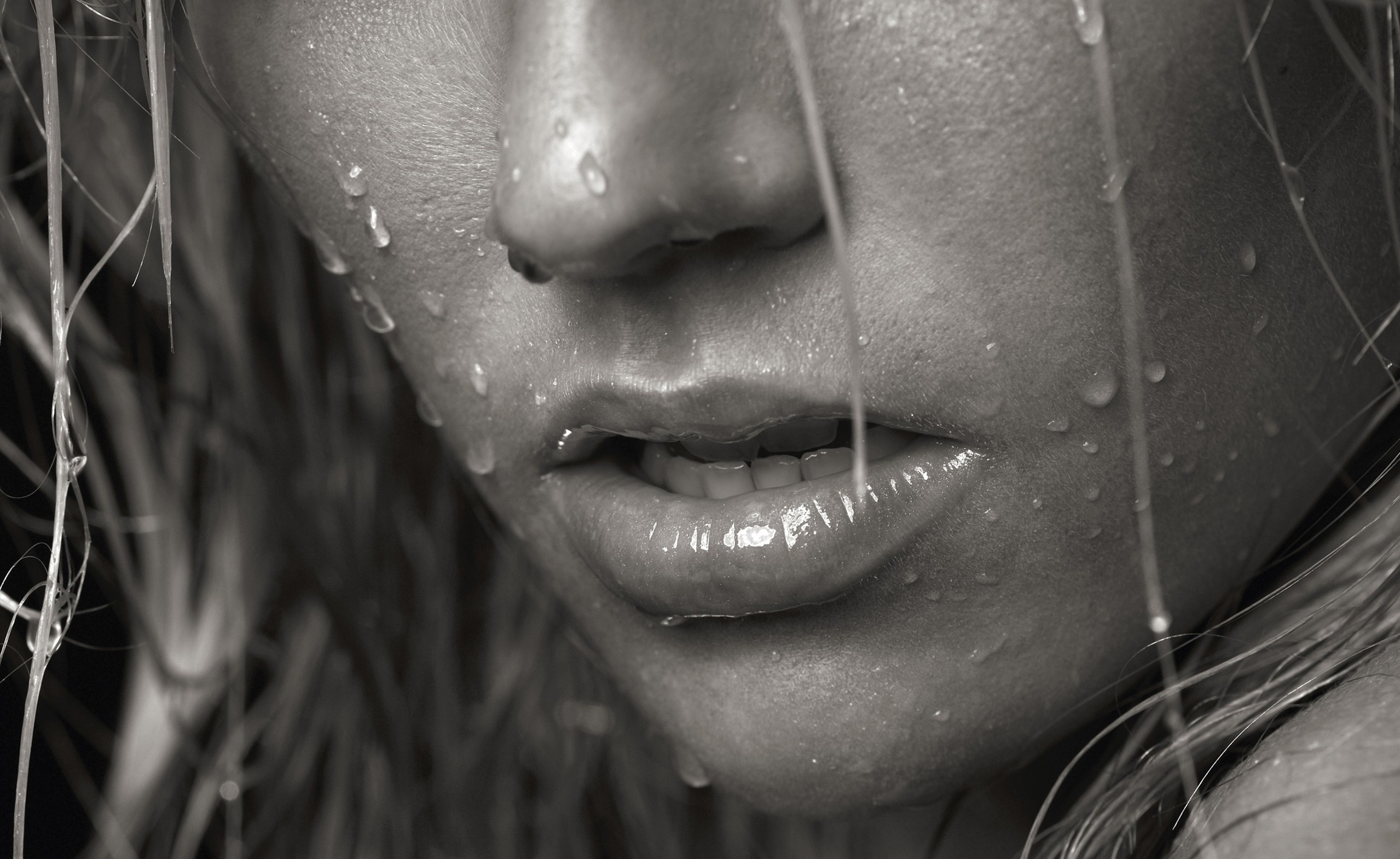 Close up of a woman's face with water droplets HD Wallpaper