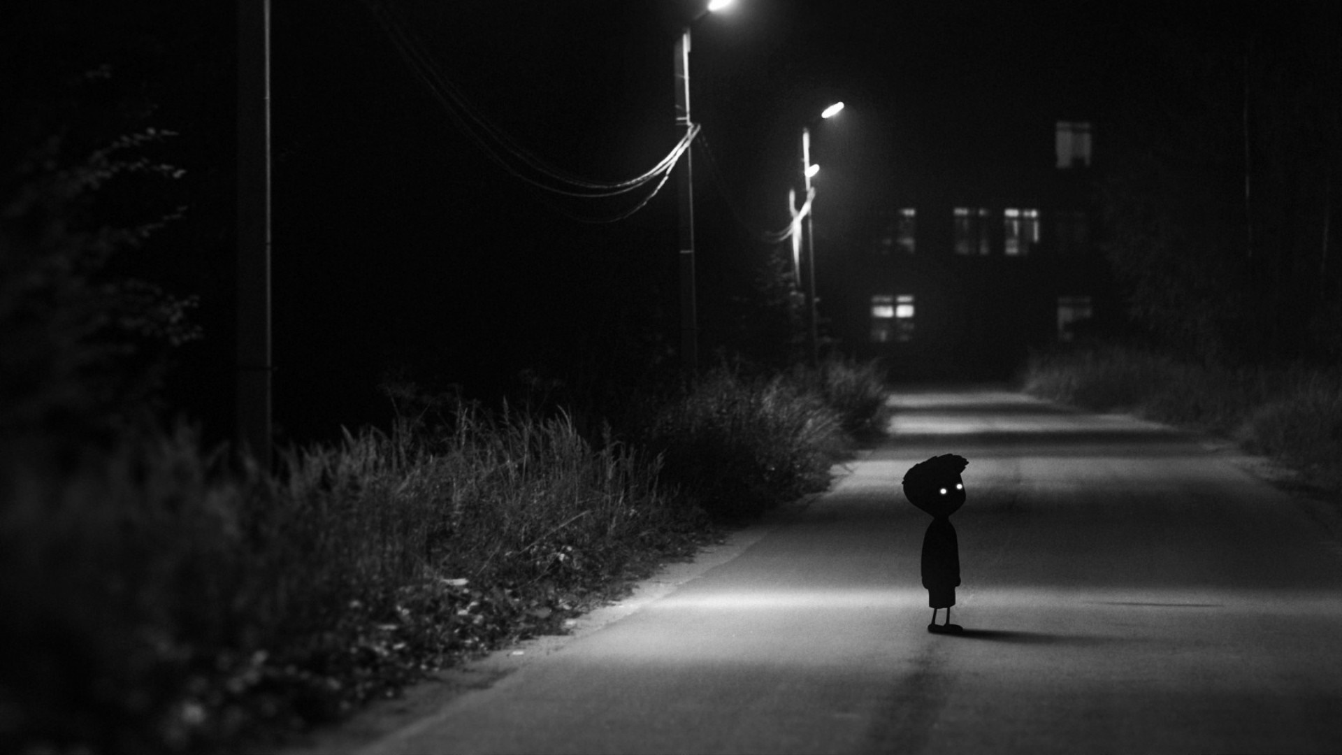 Boy with glowing eyes on a dark road HD Wallpaper