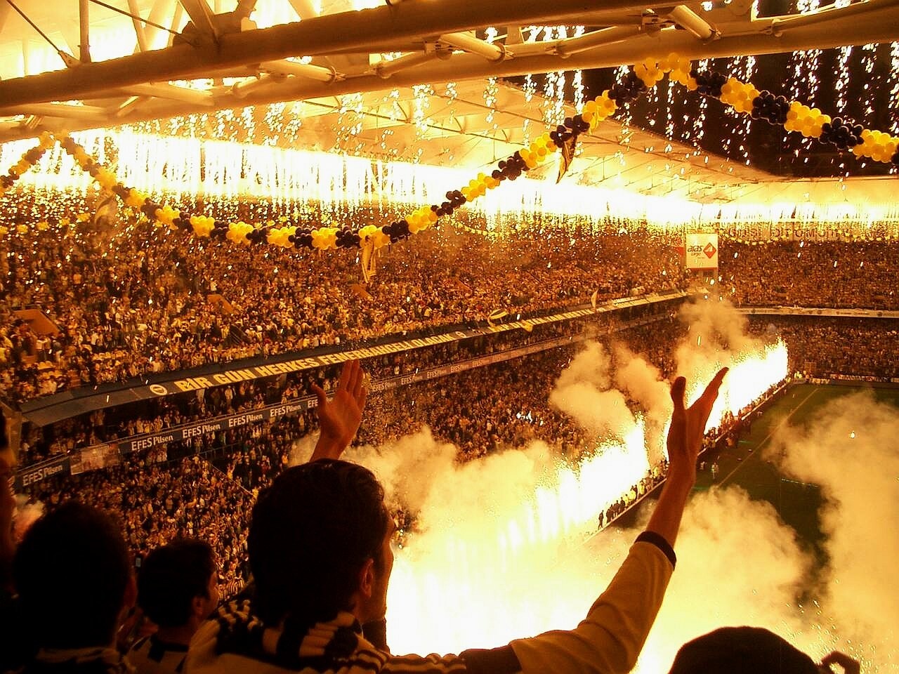 Fenerbahce stadium with fireworks and fans HD Wallpaper