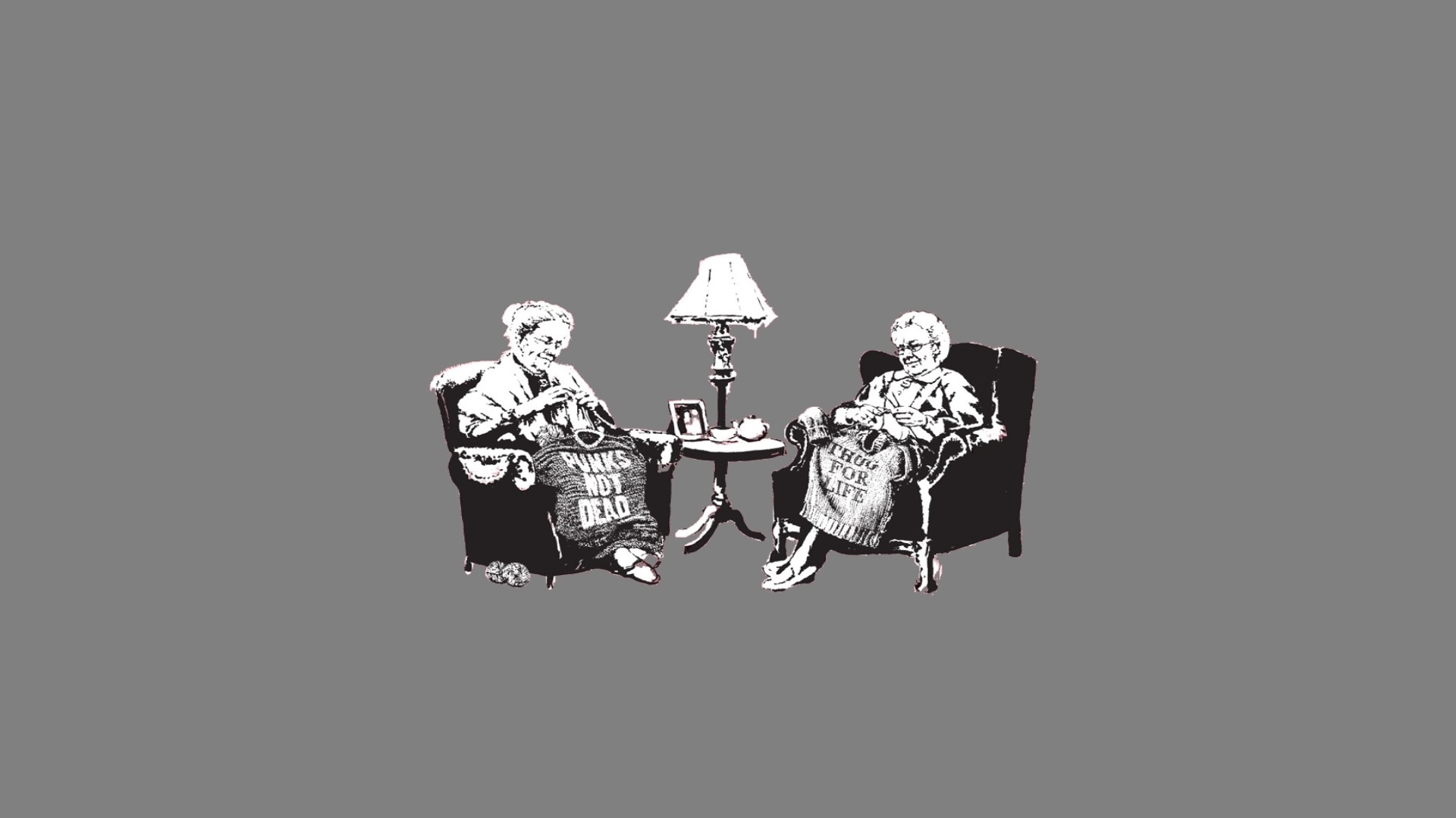 Two elderly women knitting with punk slogans HD Wallpaper
