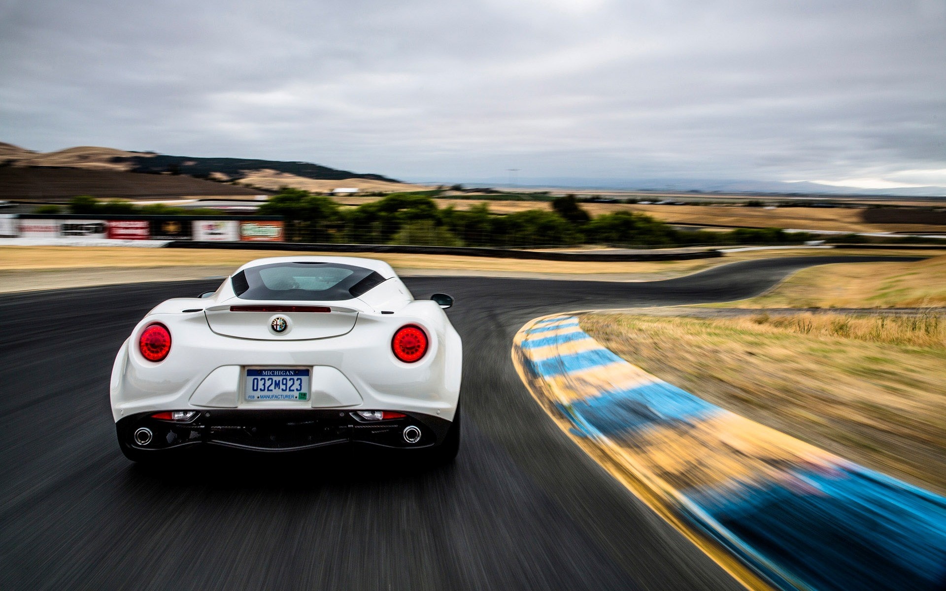 White Alfa Romeo 4C on a Racetrack HD Wallpaper
