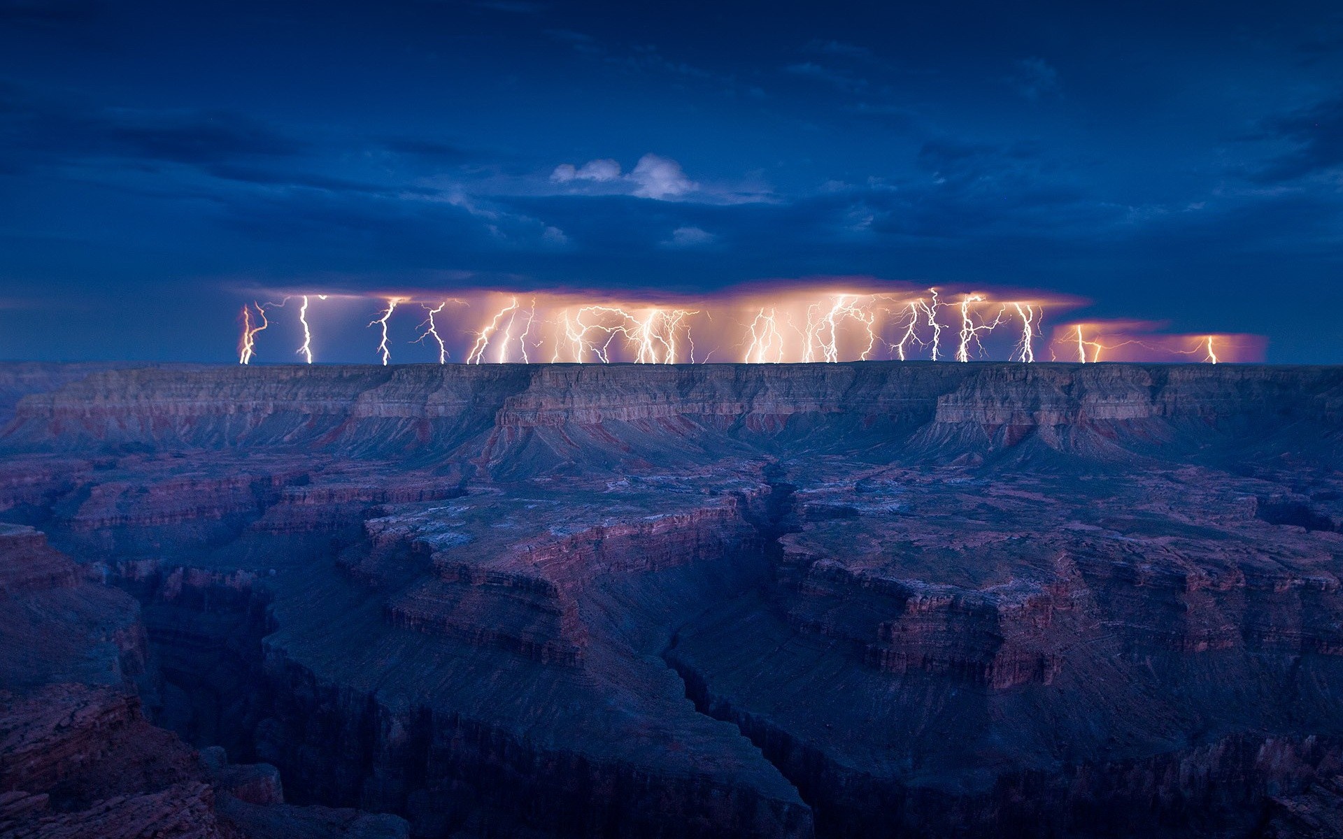 Lightning storm over the Grand Canyon at dusk HD Wallpaper