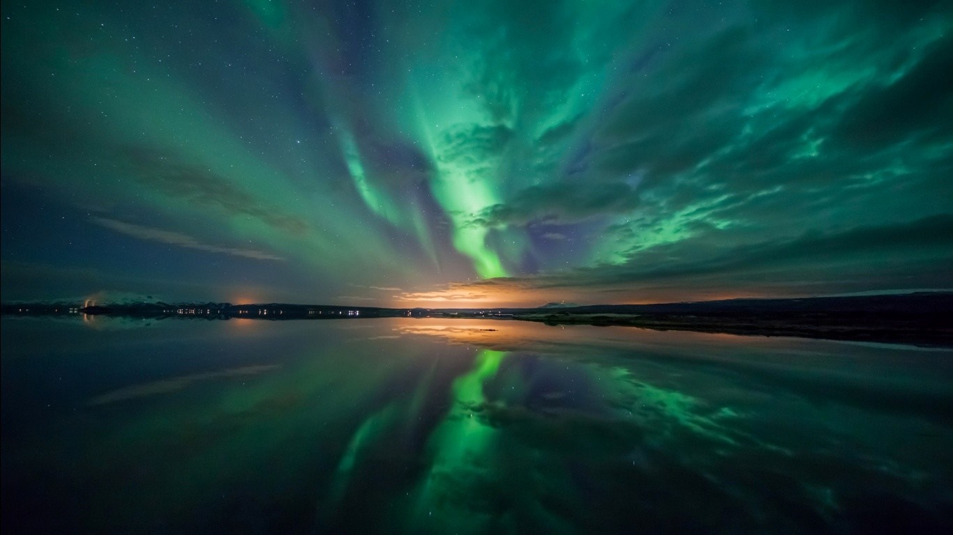 Aurora Borealis reflected in a lake at night HD Wallpaper