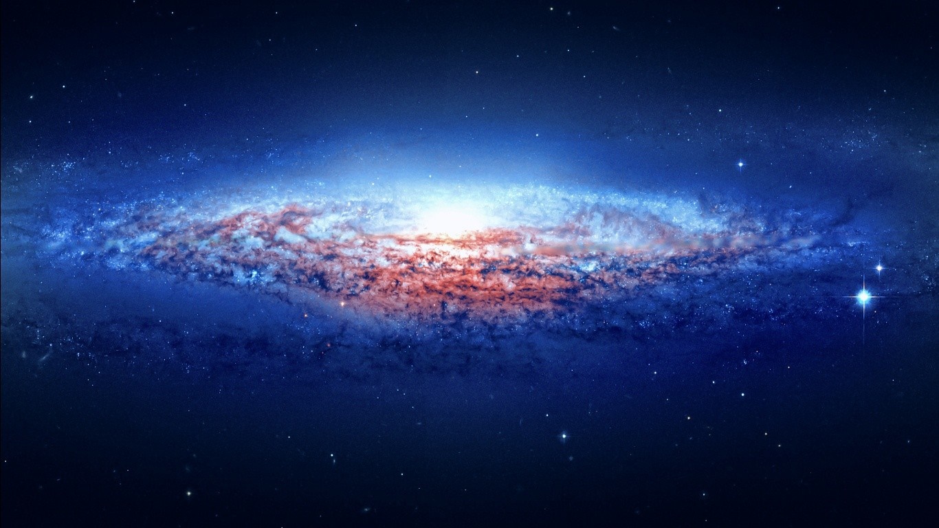 A spiral galaxy in deep space with stars HD Wallpaper
