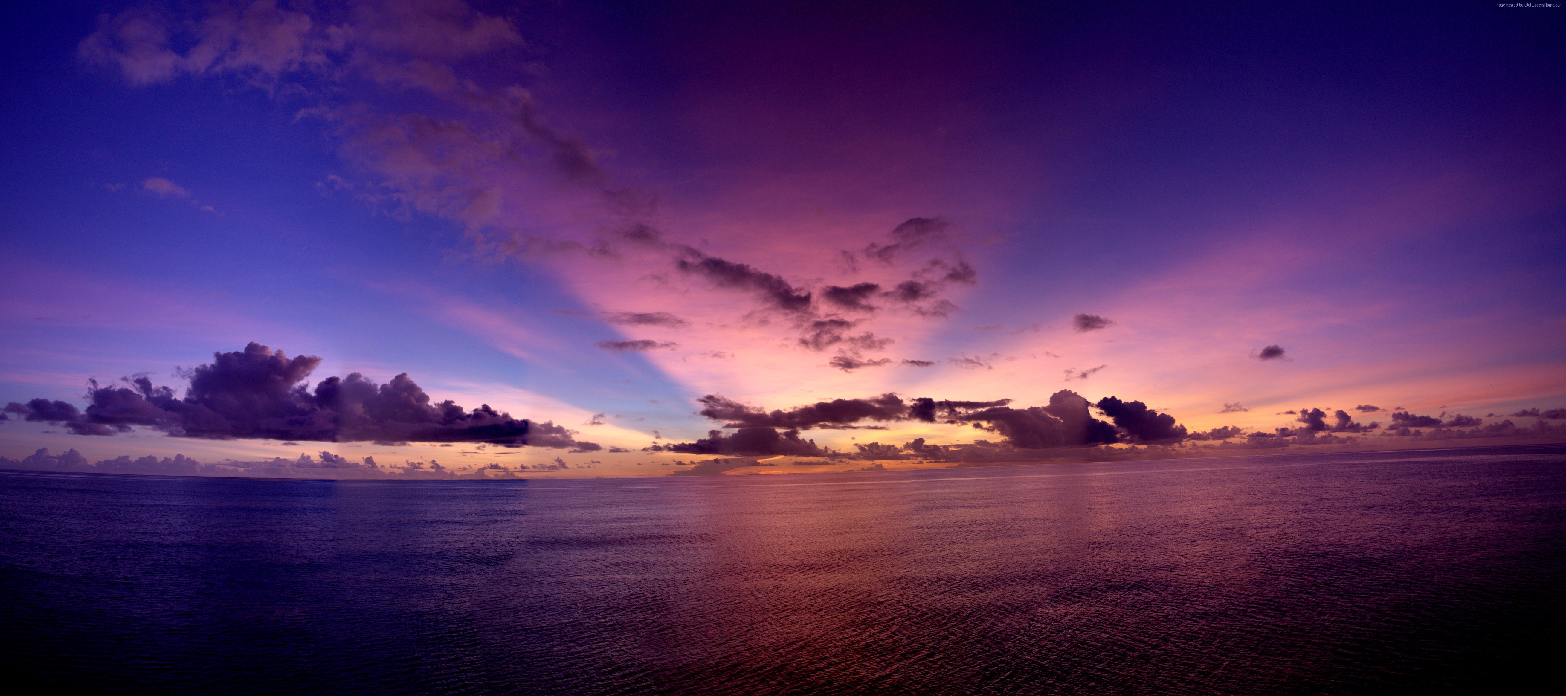 Purple sunset rays over the Pacific Ocean 4K HD Wallpaper