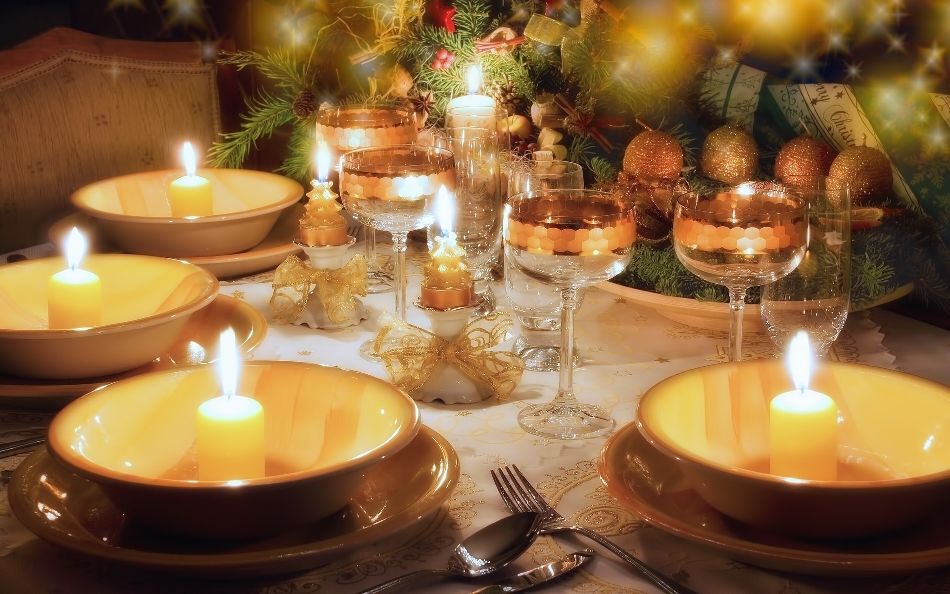 Christmas dinner table setting with candles and decorations HD Wallpaper