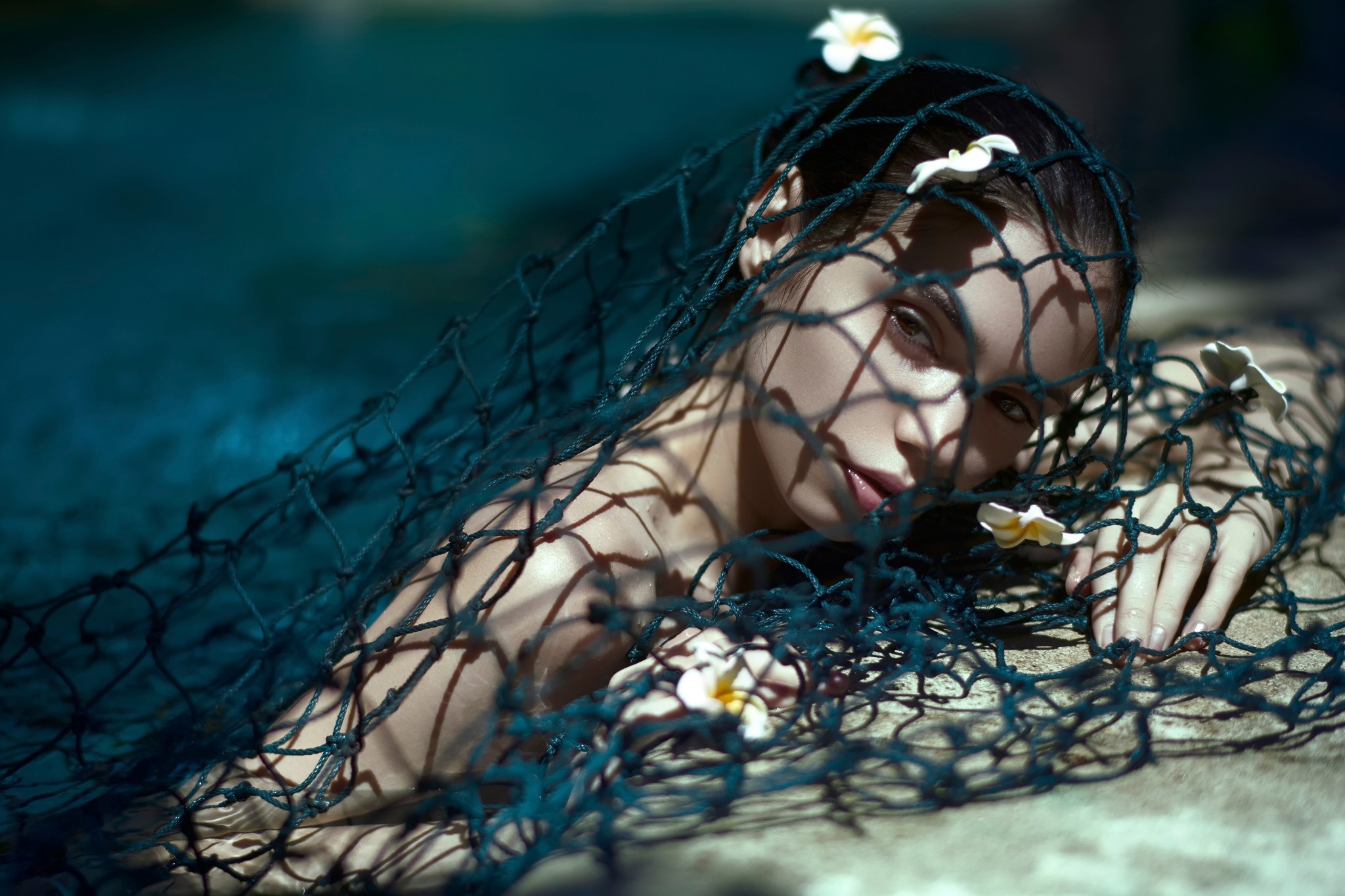 Woman in a fishing net with flowers HD Wallpaper