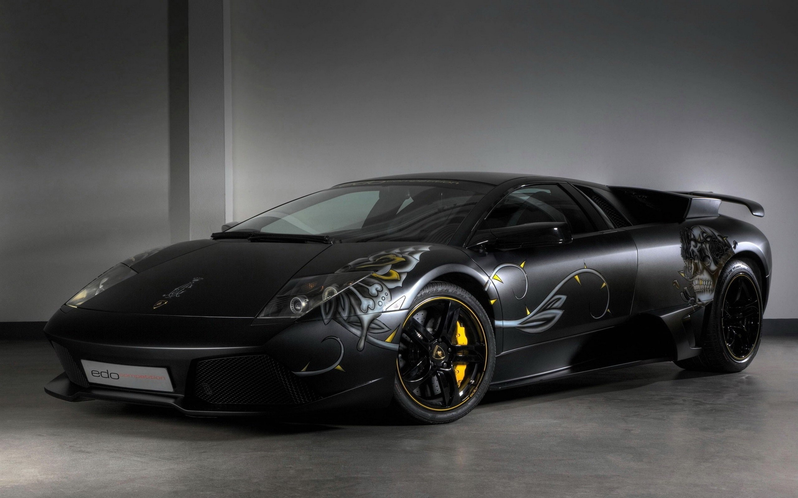 Black Lamborghini Murcielago with custom graphics HD Wallpaper