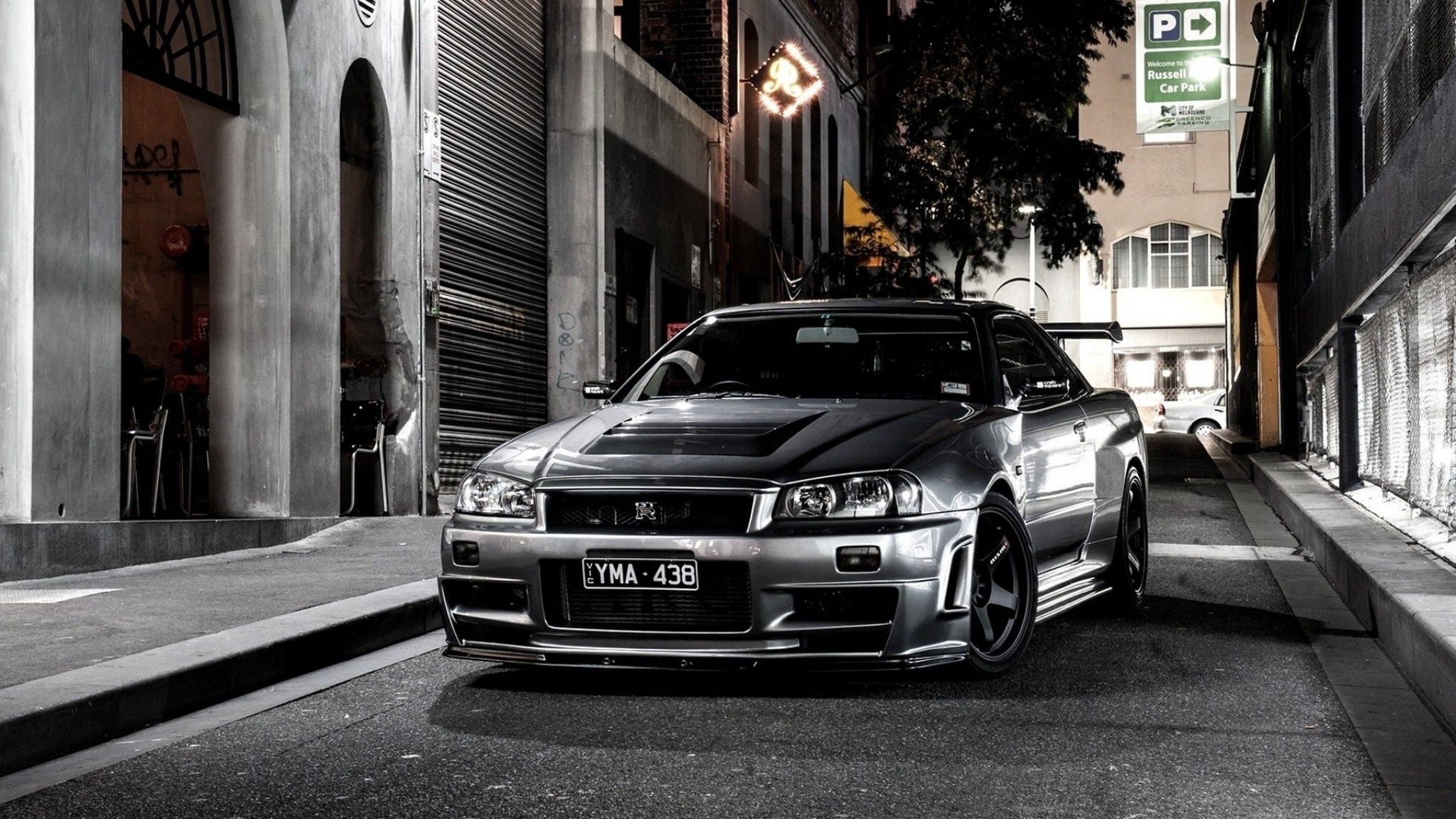 Nissan Skyline GT-R R34 Nismo Z-Tune in a City Alley HD Wallpaper