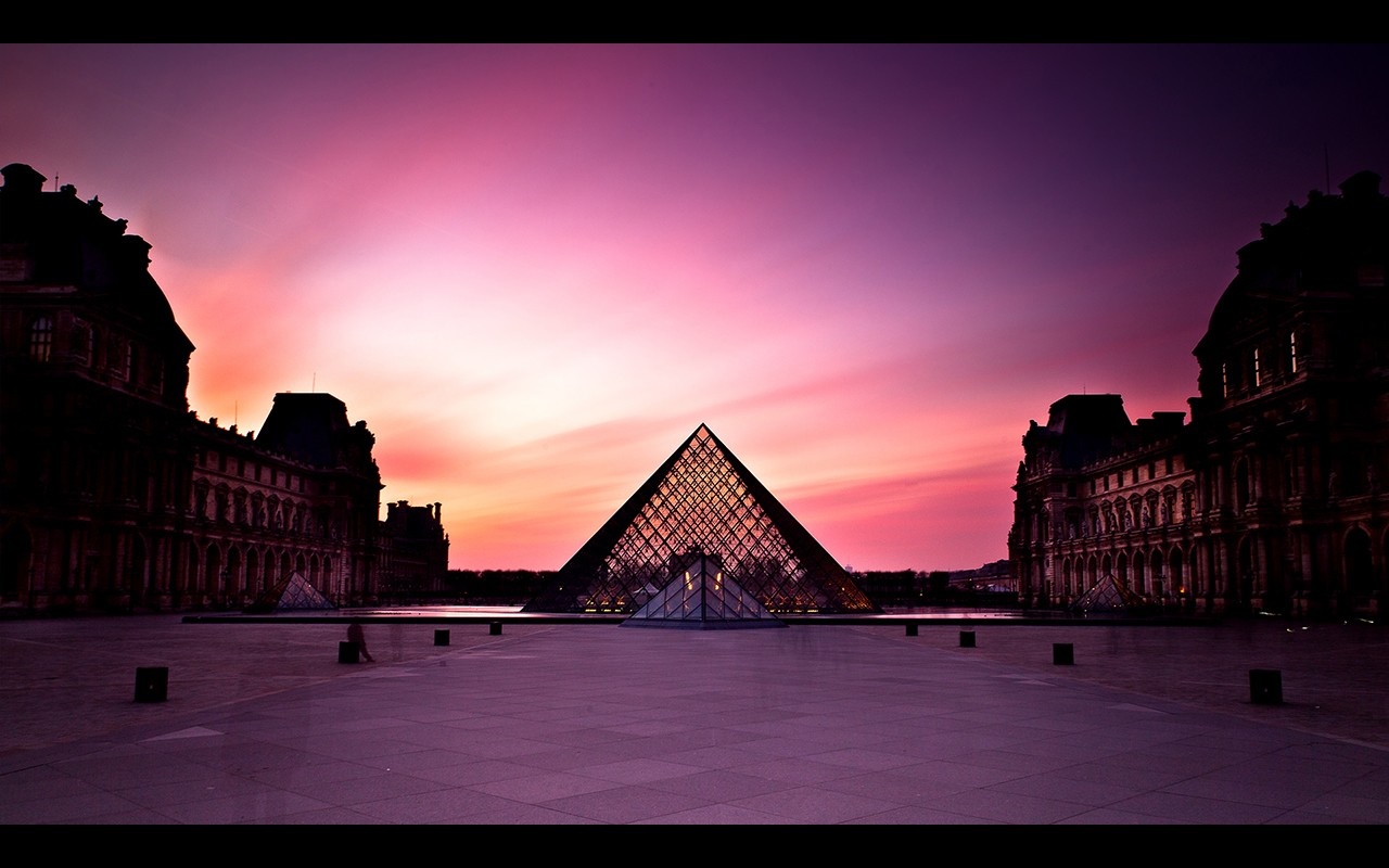 Louvre Pyramid at sunset with pink and purple sky HD Wallpaper