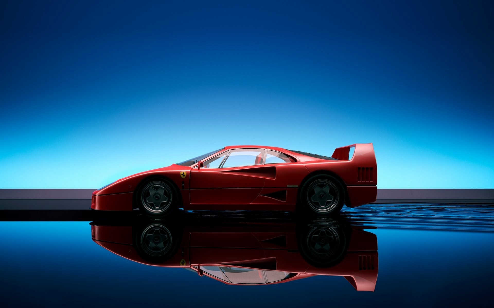 Red Ferrari F40 sports car reflected on wet surface HD Wallpaper