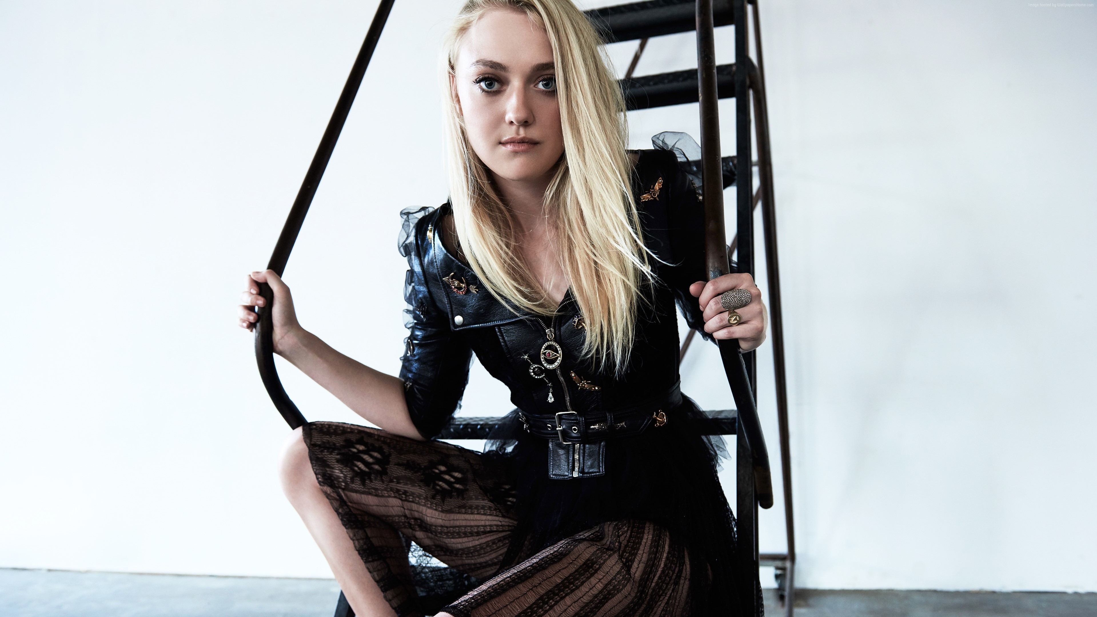 Dakota Fanning sitting on a metal staircase HD Wallpaper