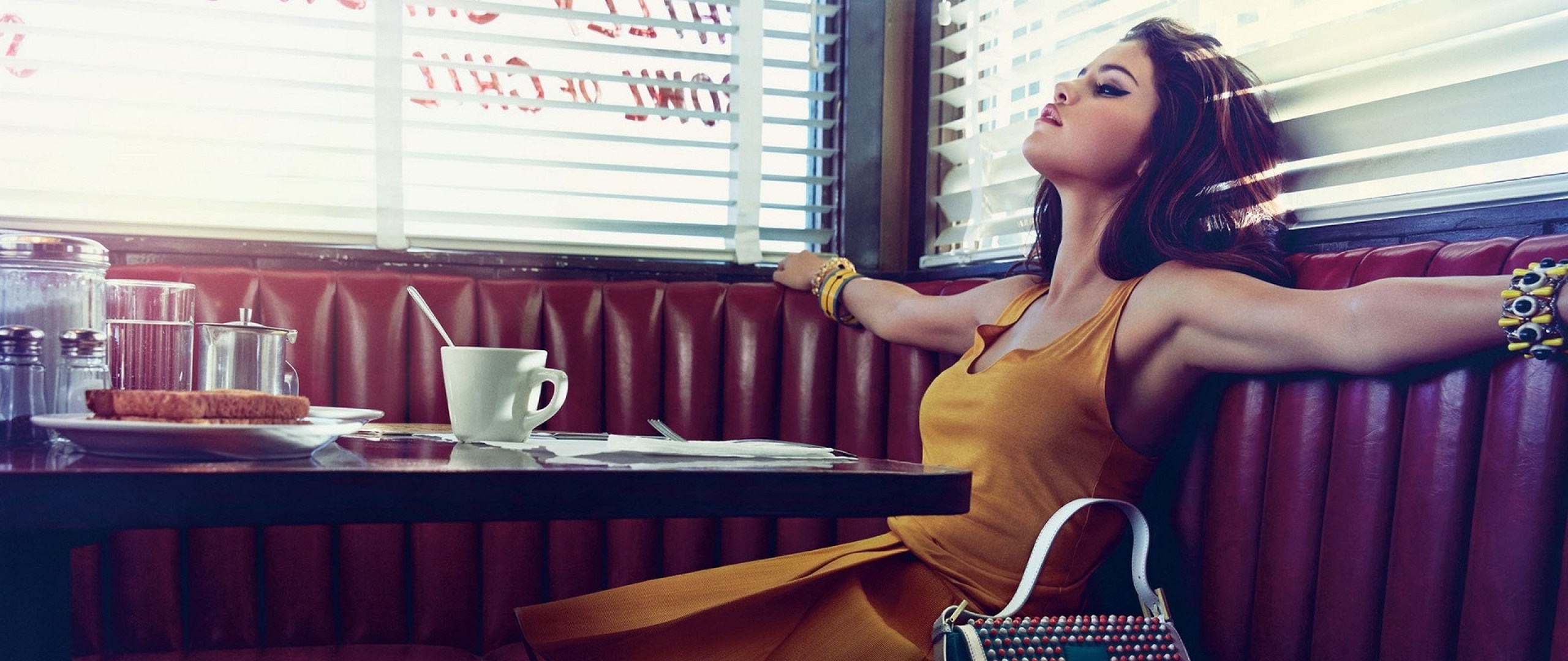 Selena Gomez in a diner booth HD Wallpaper