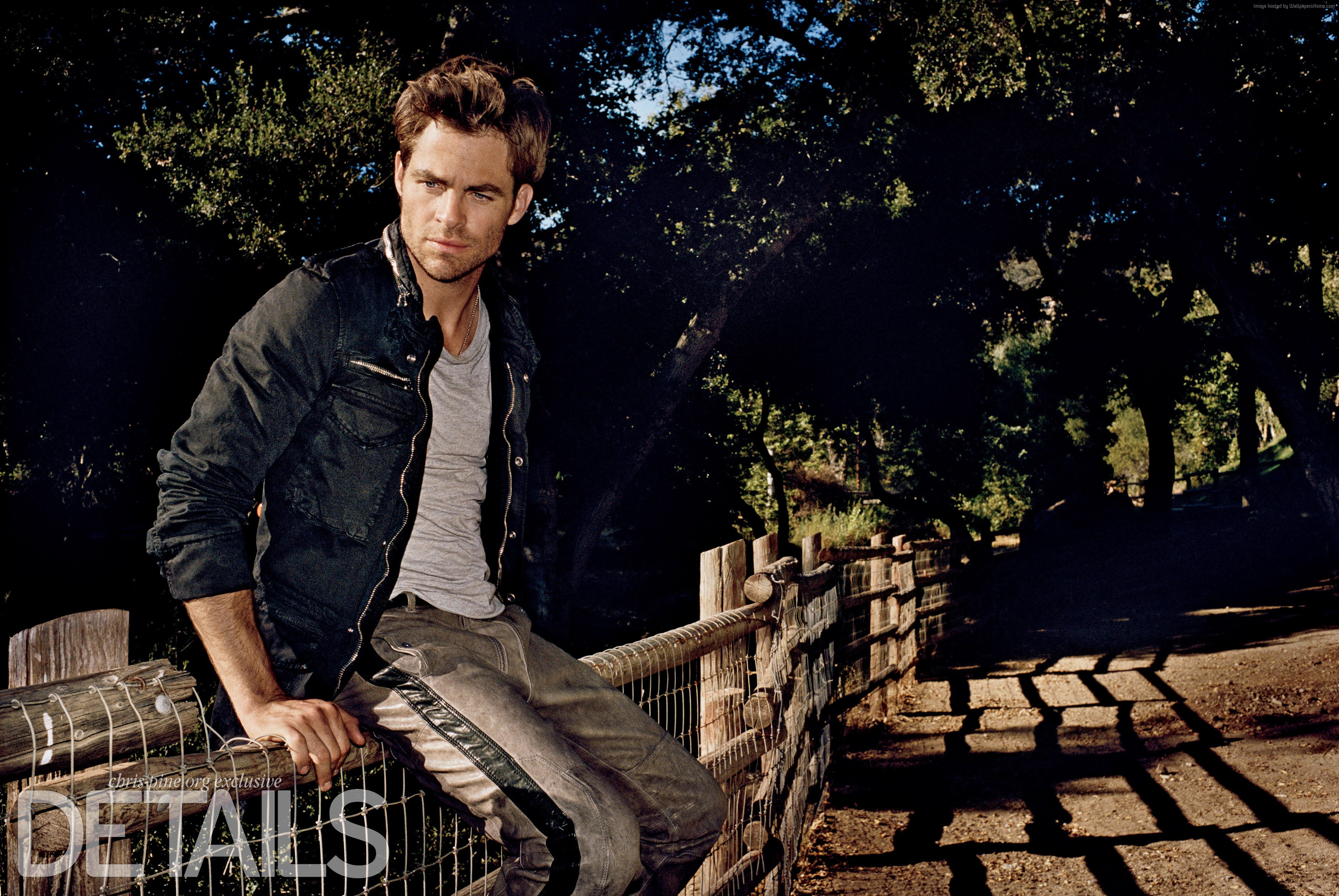 Chris Pine sitting on a fence HD Wallpaper