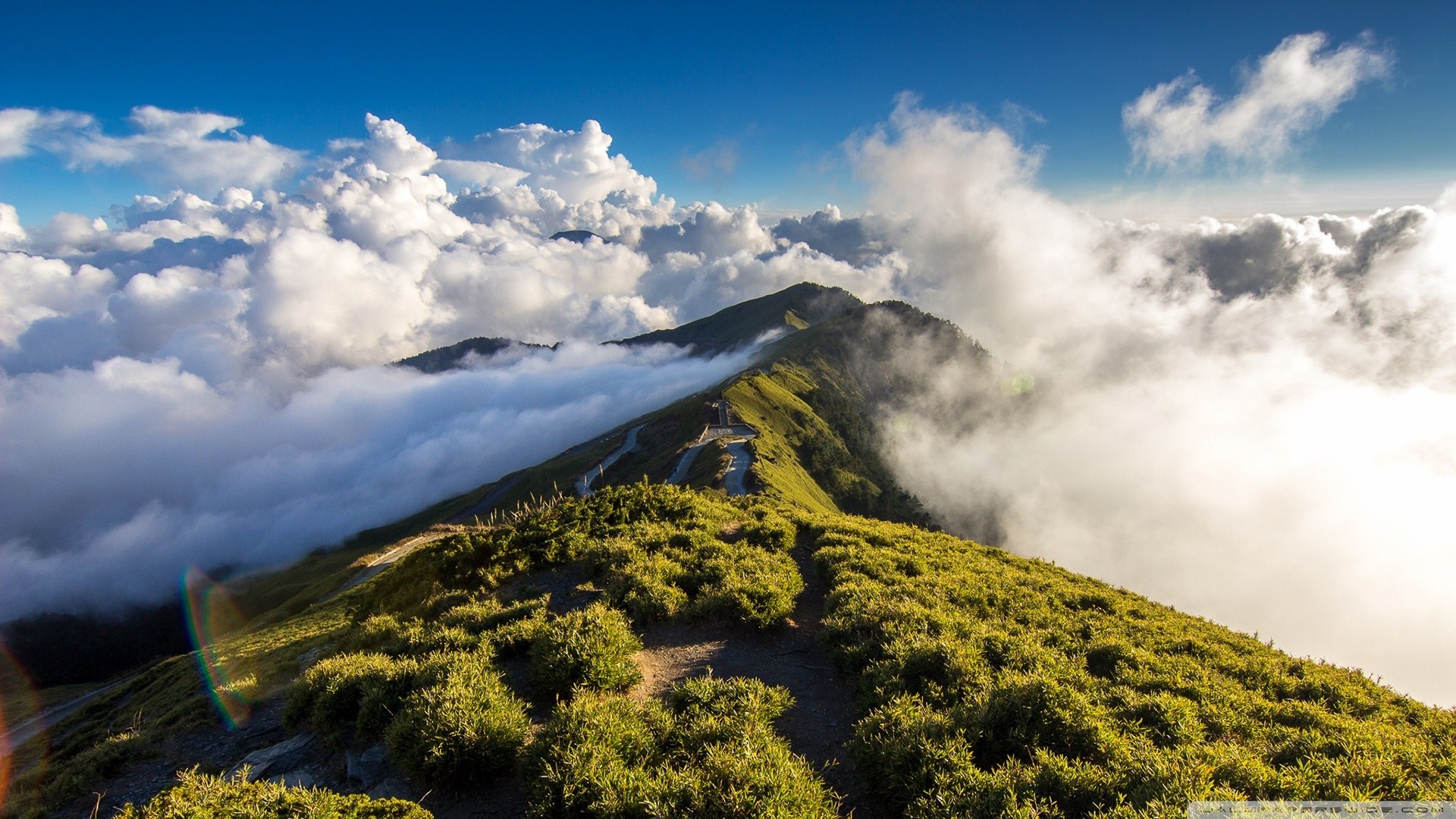Mountain ridge with clouds and blue sky HD Wallpaper