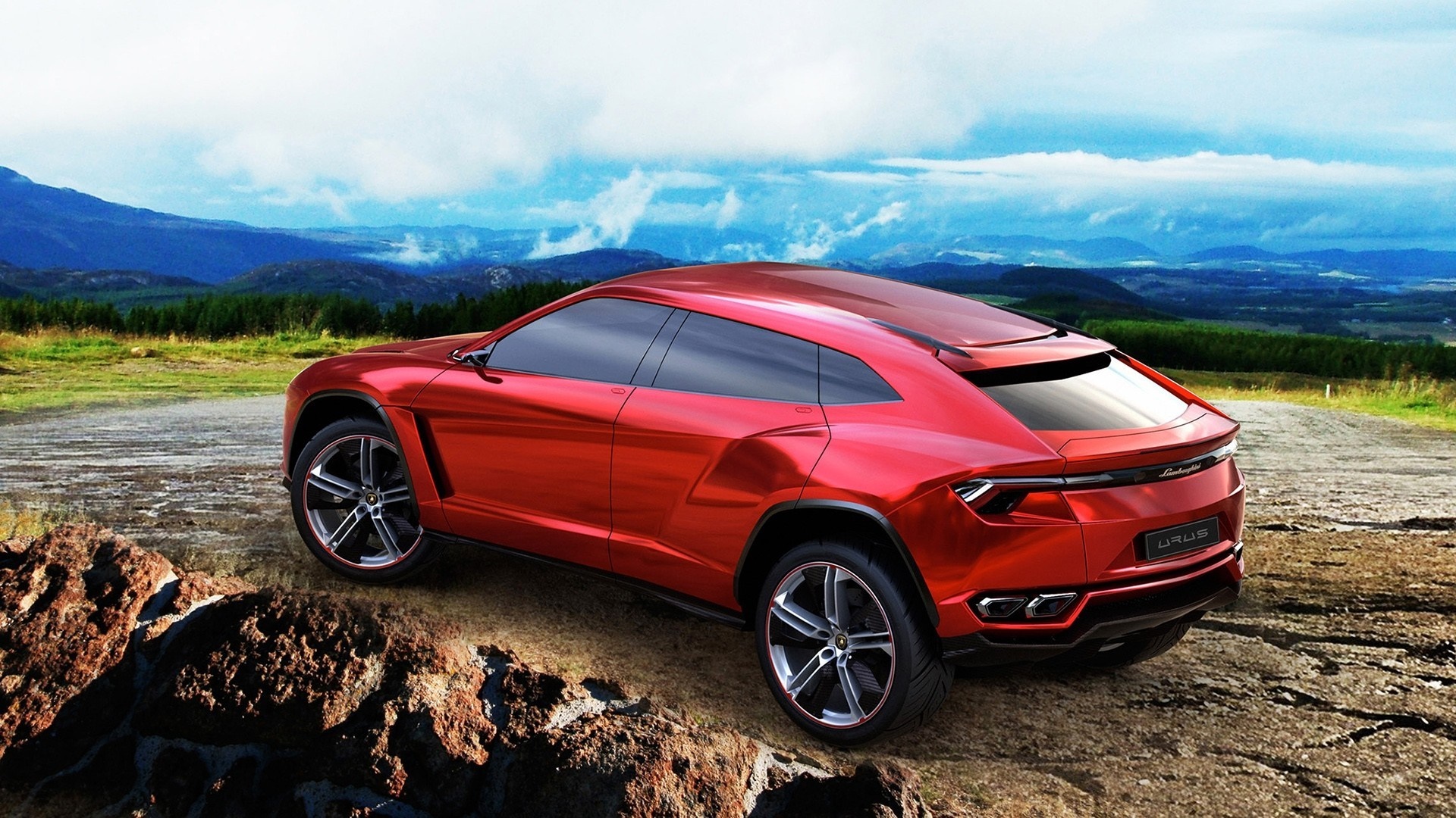 Red Lamborghini Urus concept car on rocky terrain HD Wallpaper