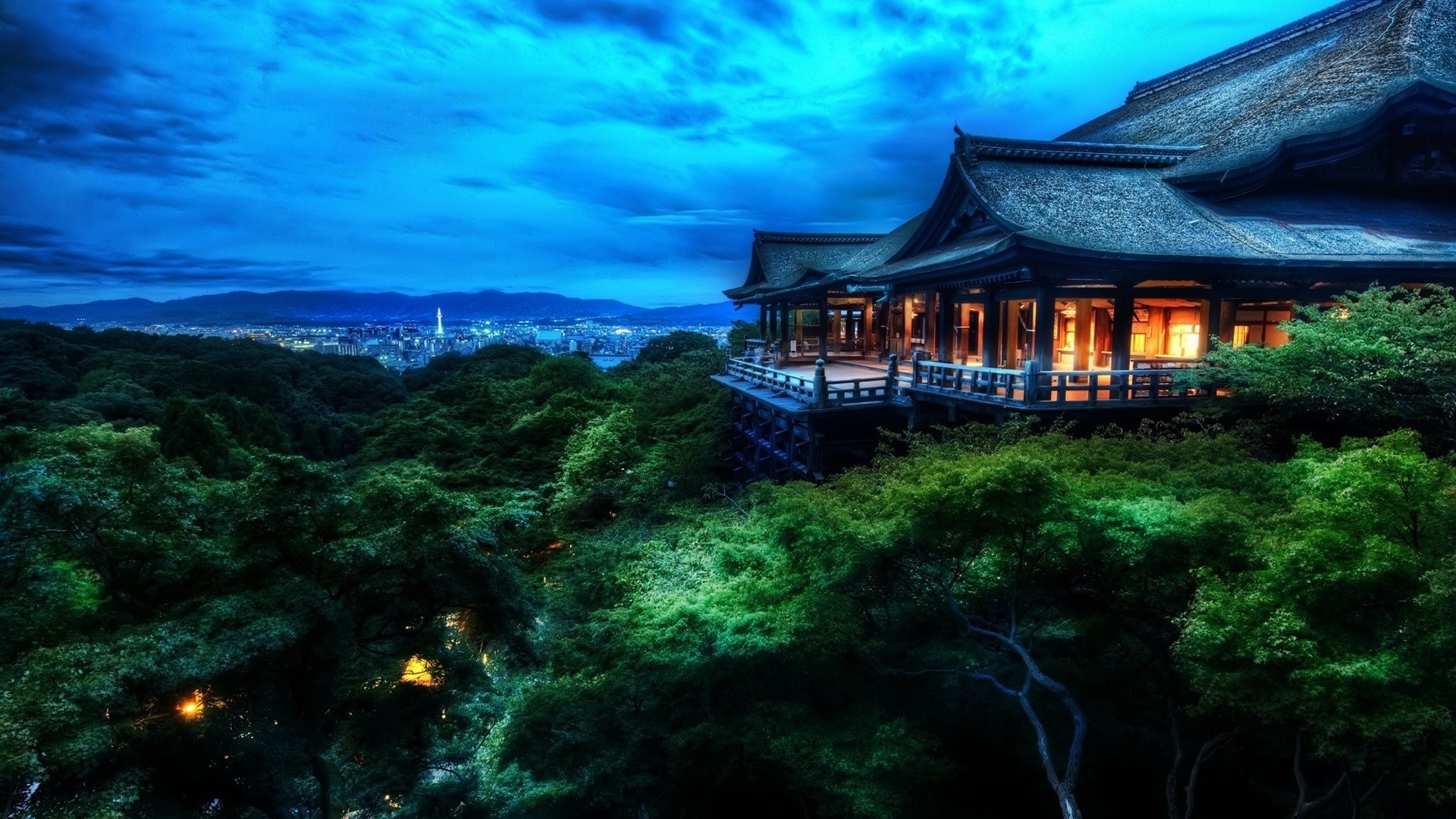 Japanese temple overlooking a city at night HD Wallpaper