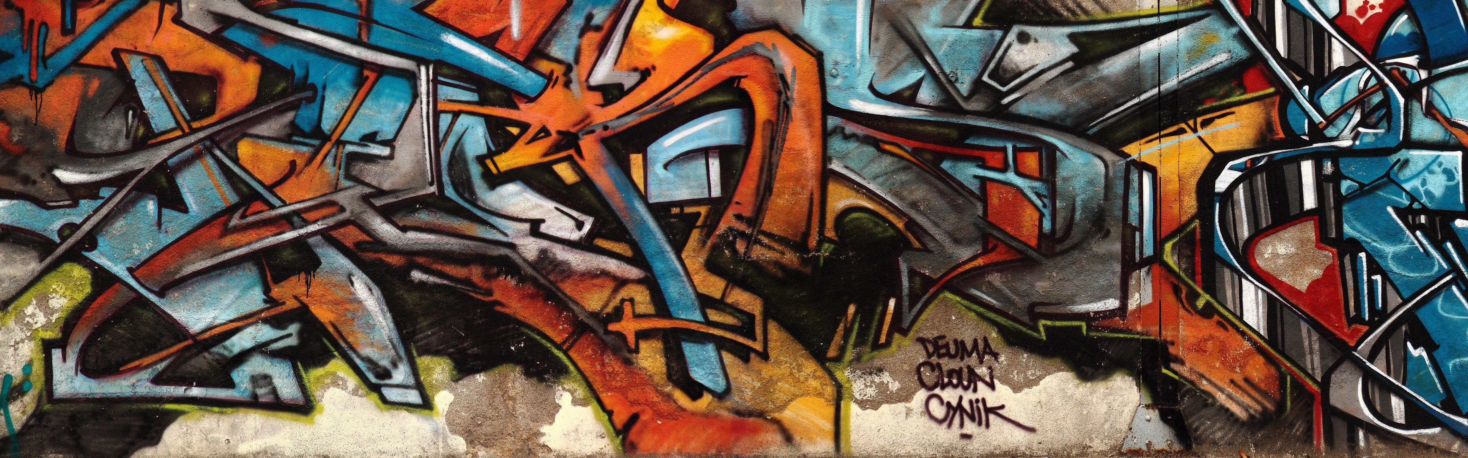 Graffiti art on a concrete wall HD Wallpaper