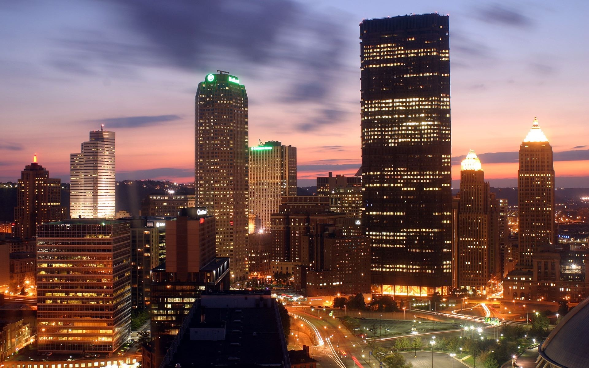 Pittsburgh skyline at dusk with illuminated skyscrapers HD Wallpaper