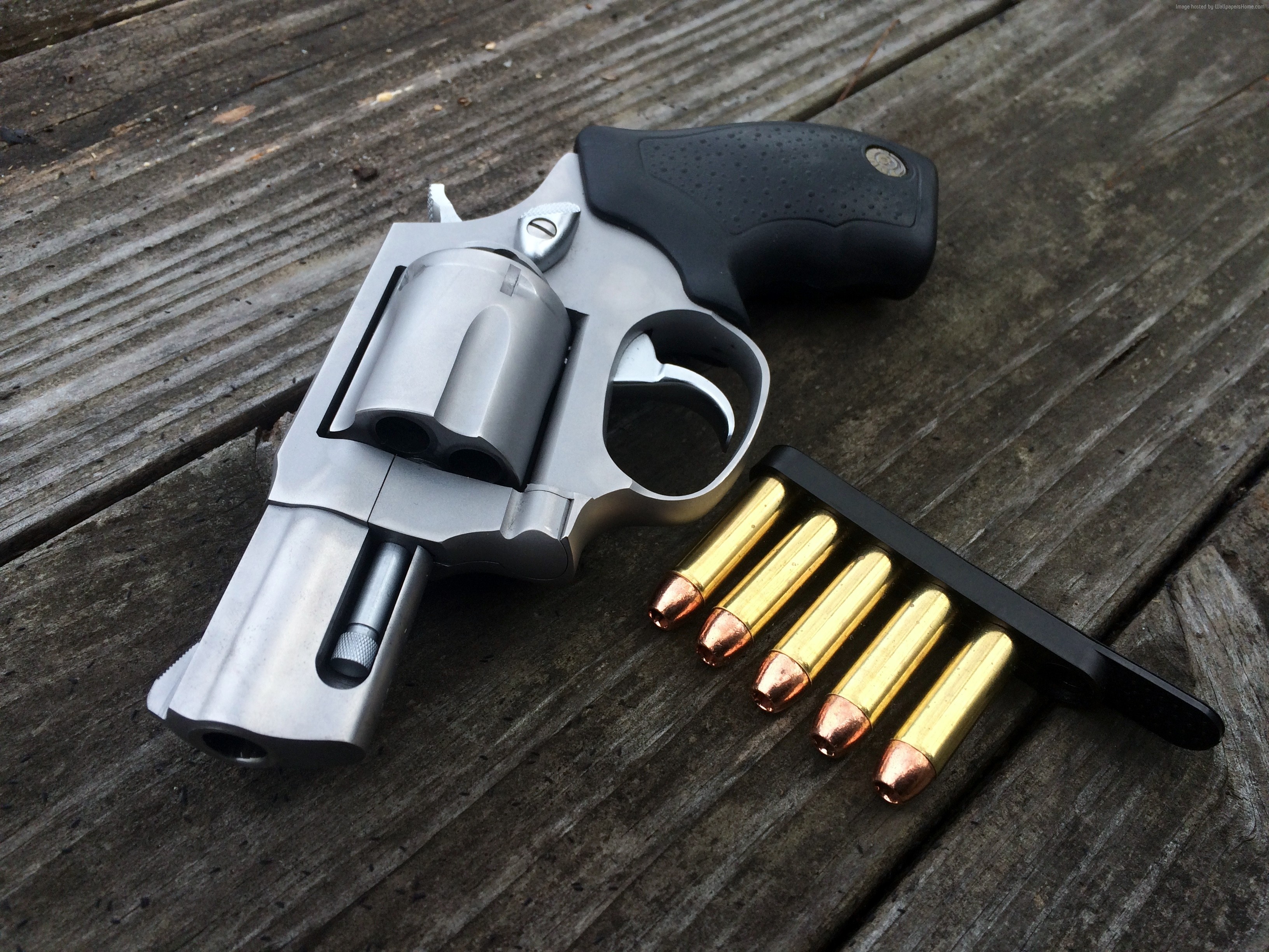 Taurus 605ss revolver with ammunition HD Wallpaper